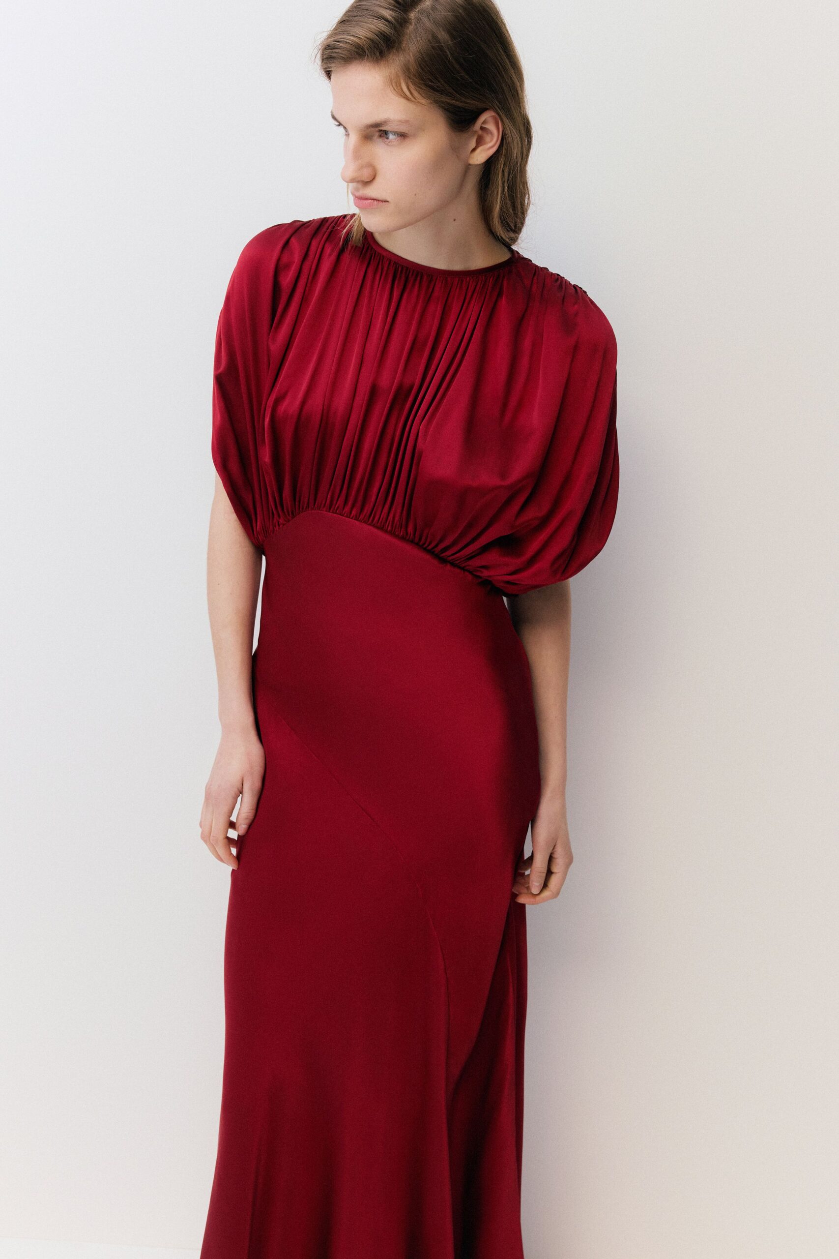 red silk fitted gown
