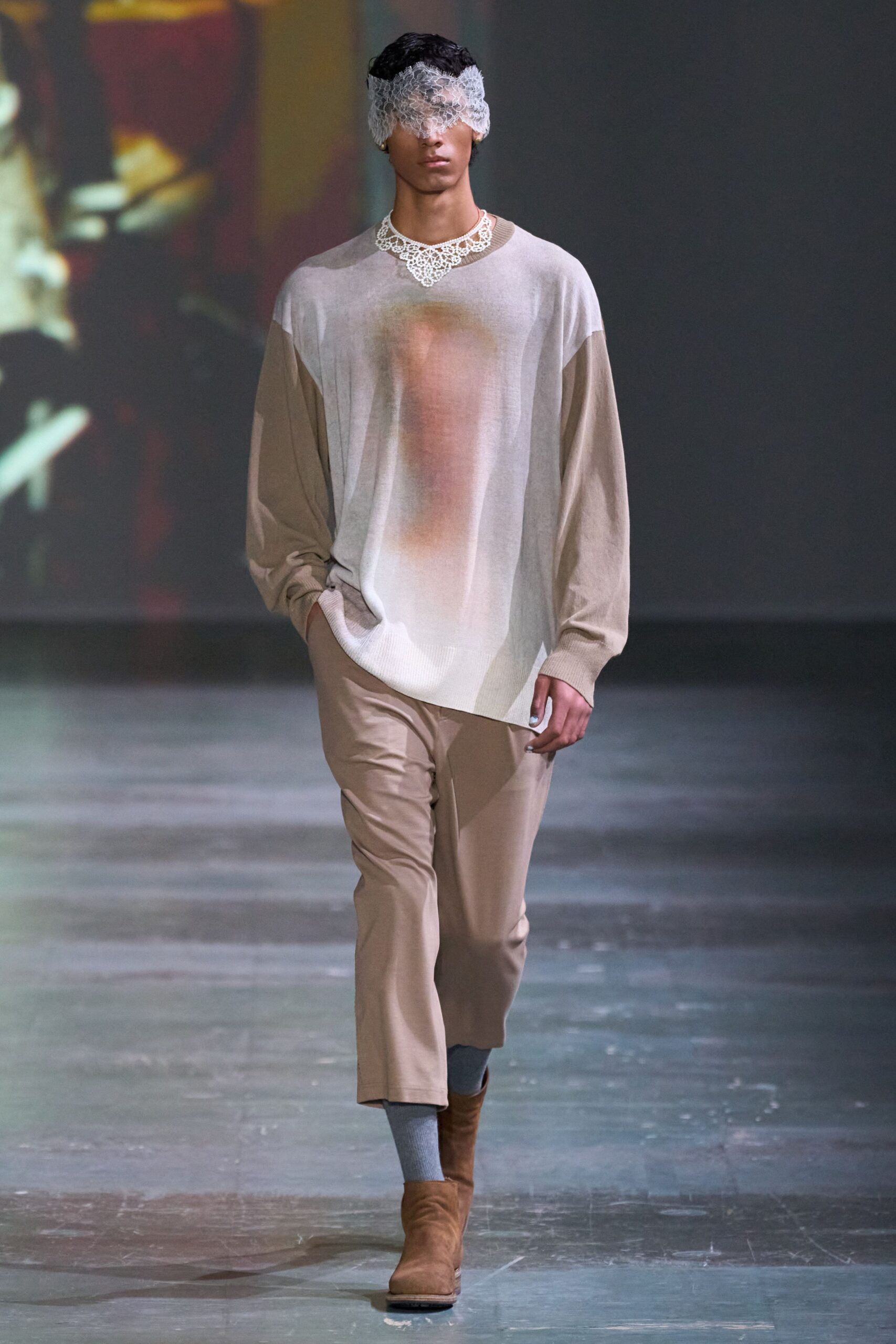 beige relaxed top and pants with brown boots