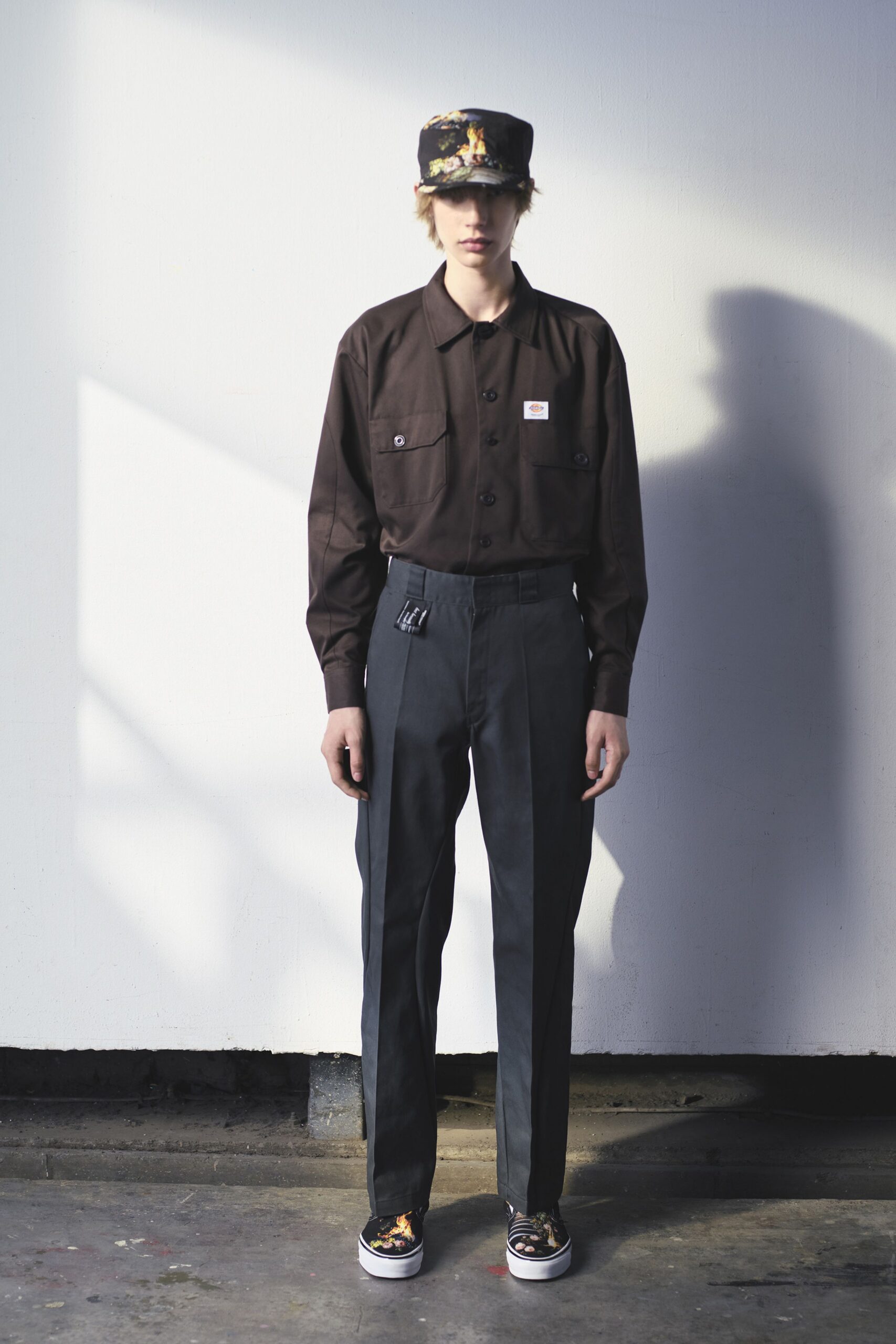 brown shirt black pants outfit