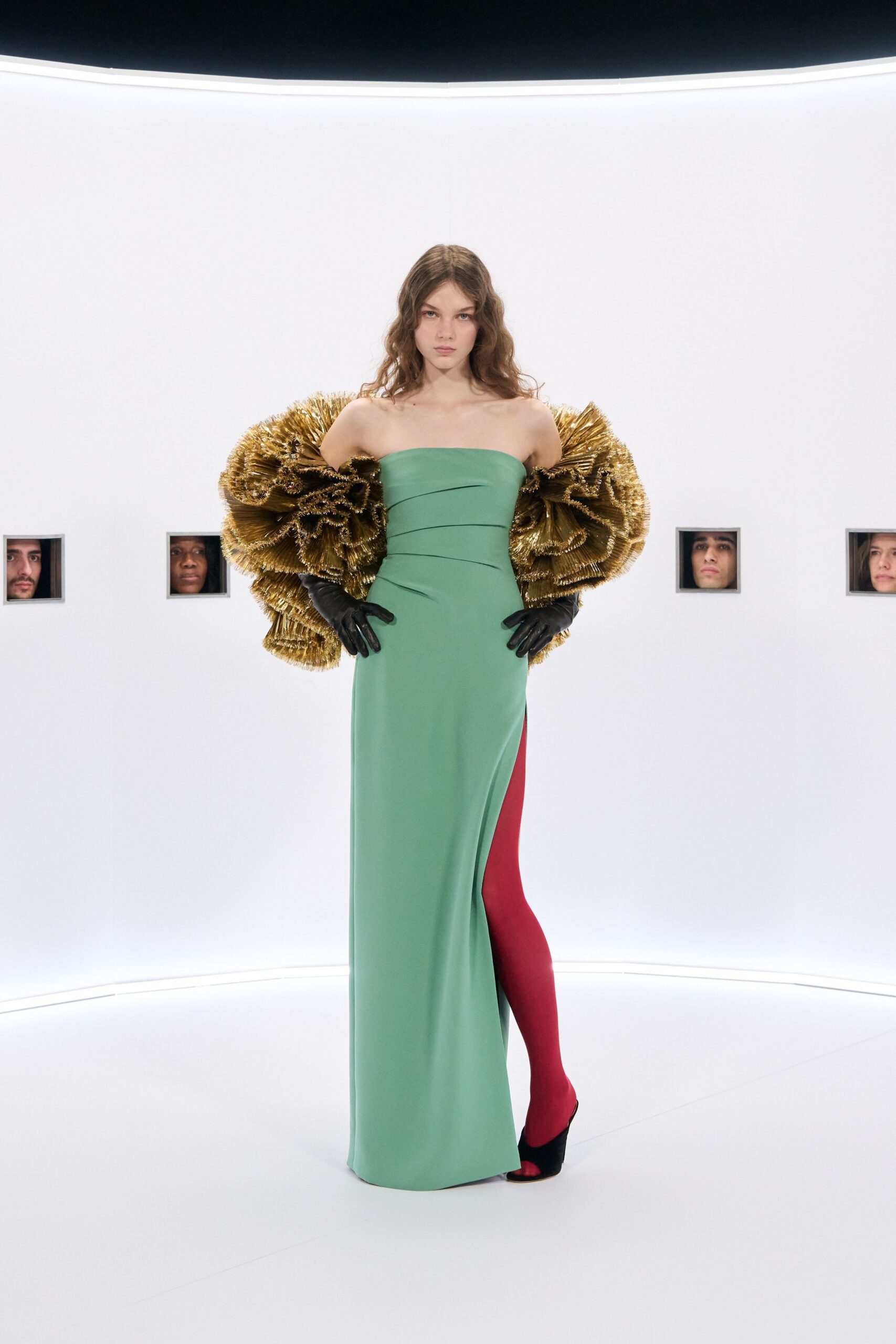 green silk strapless slit fitted pleated draped gown