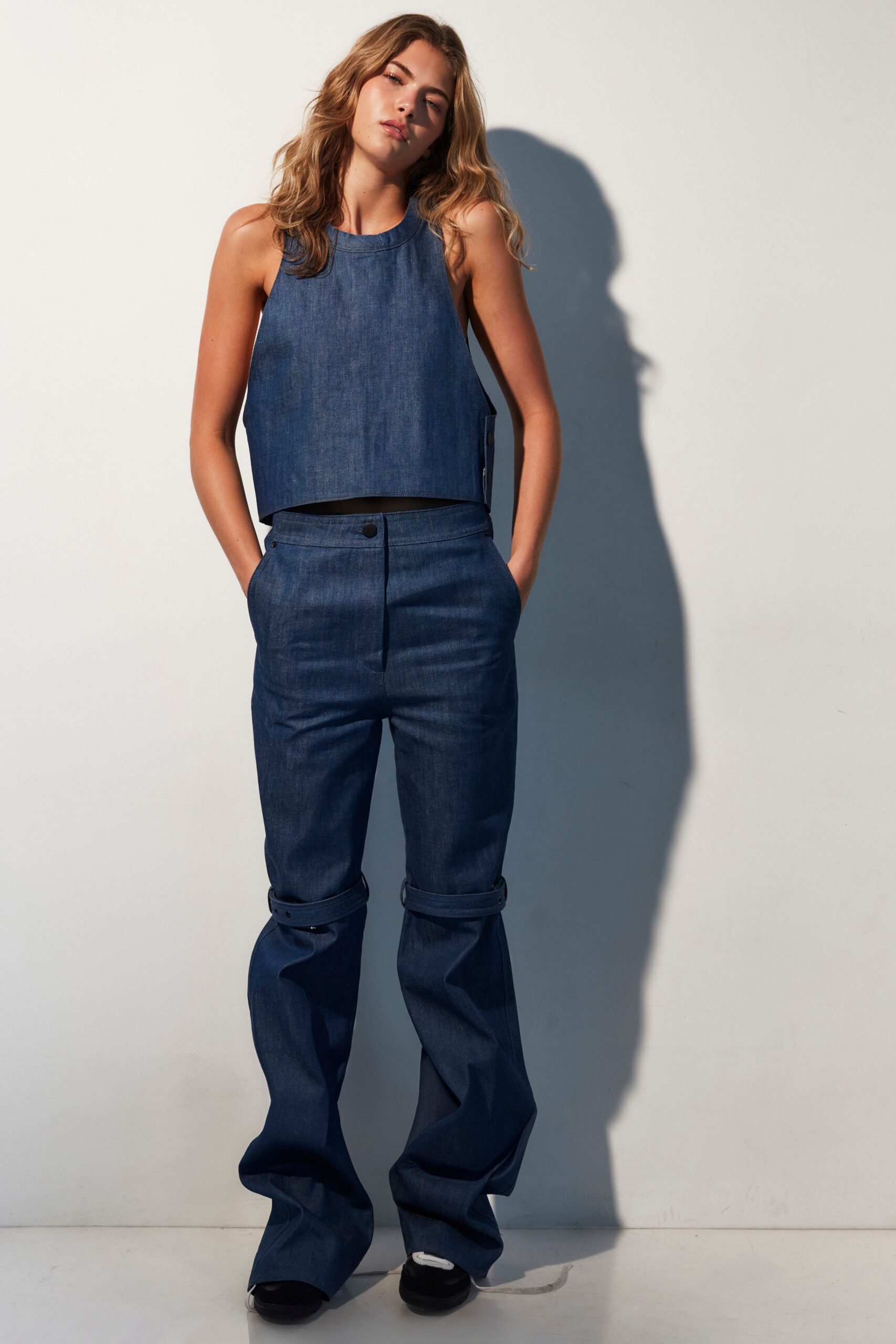 blue denim sleeveless high-neck fitted cropped top