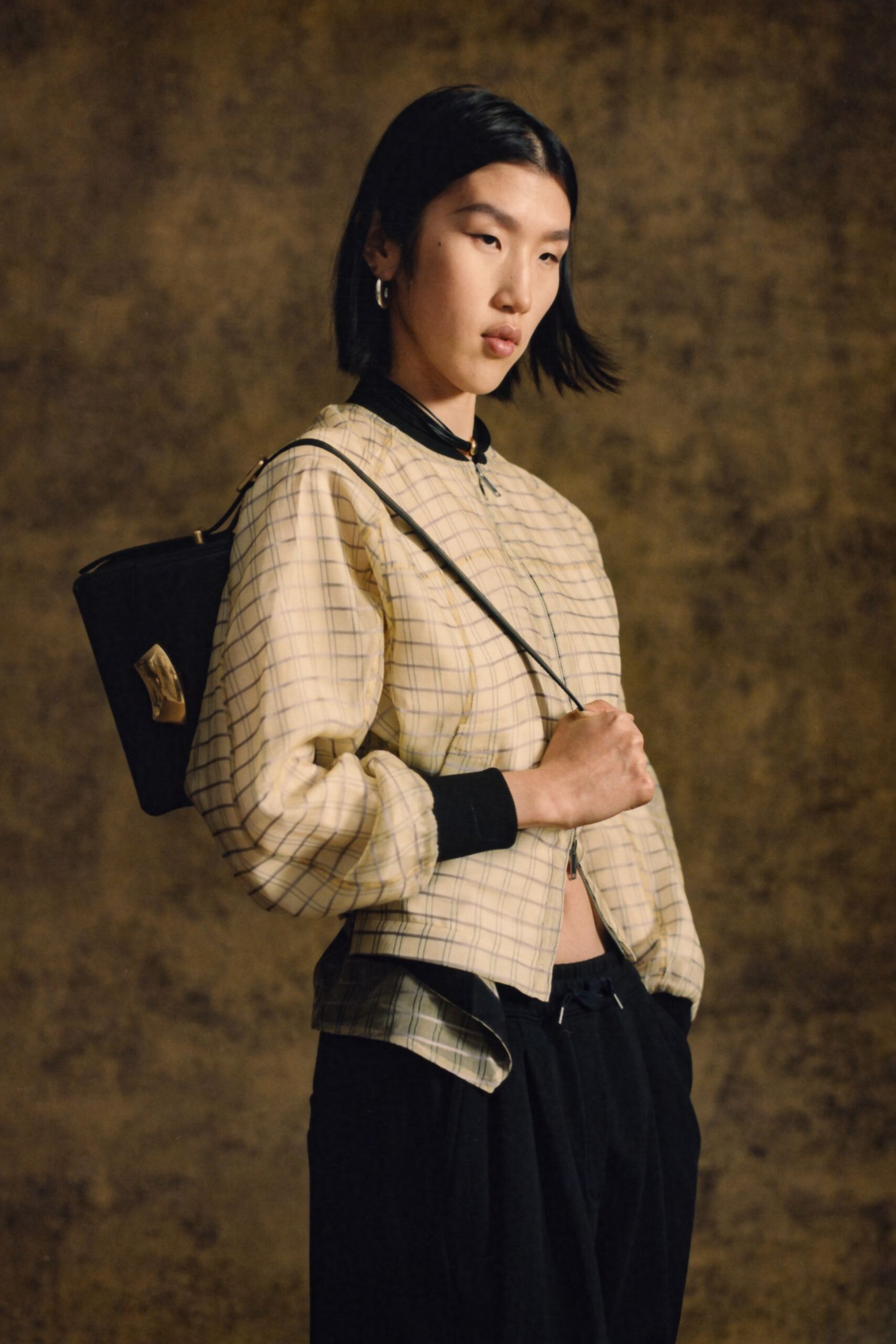 beige checked relaxed jacket with black pants