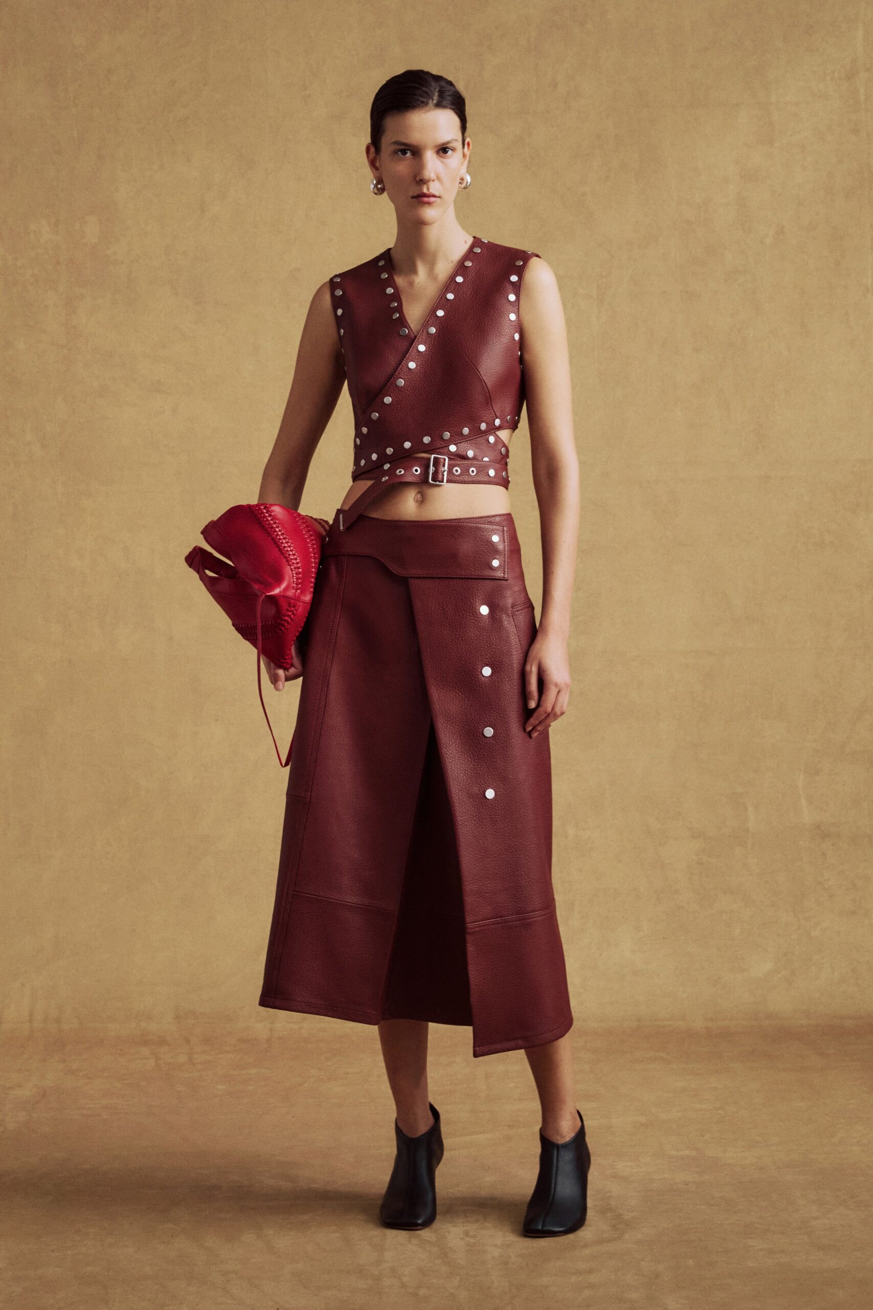 brown leather sleeveless v-neck fitted buttoned cropped top