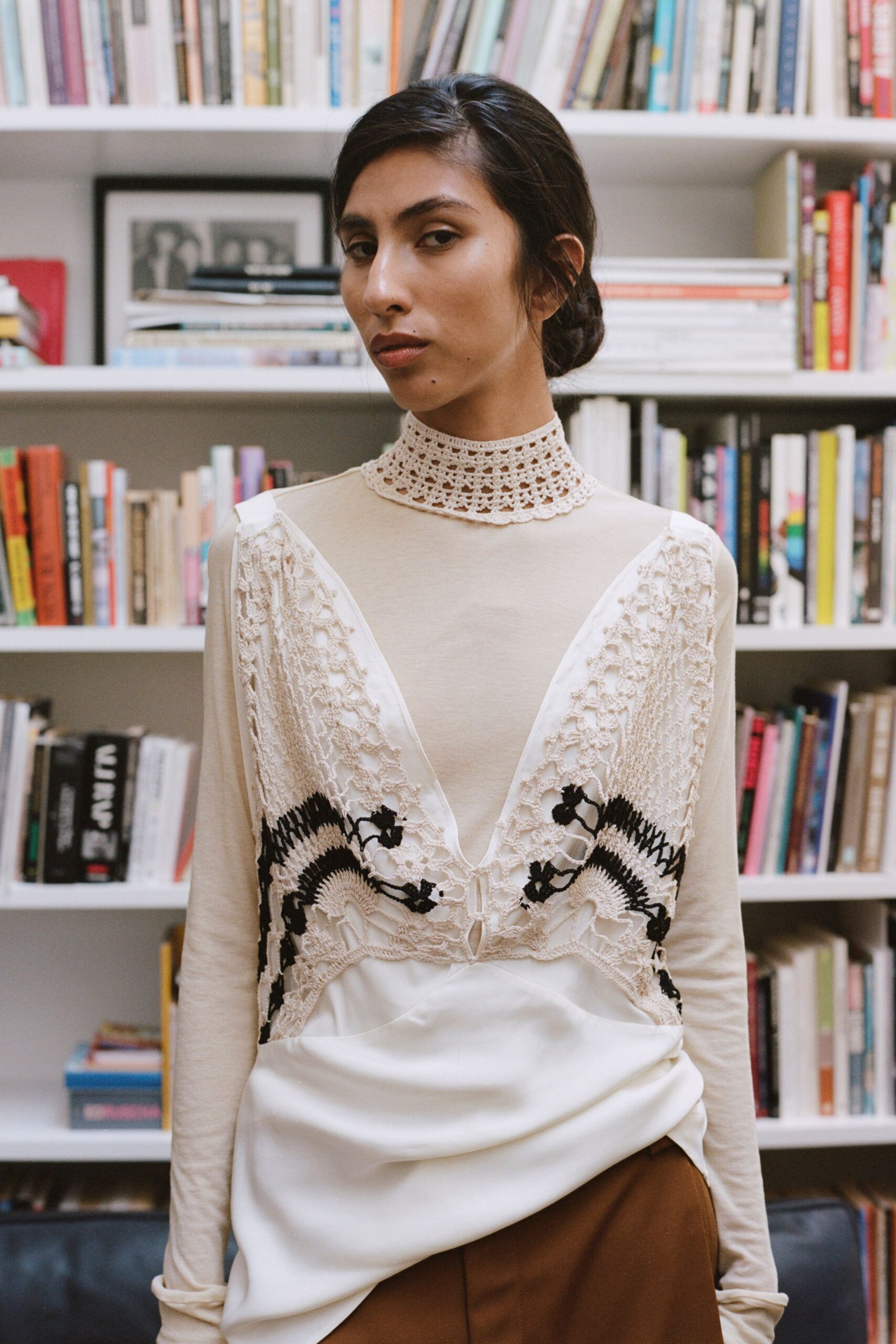 beige embroidered top and brown pants