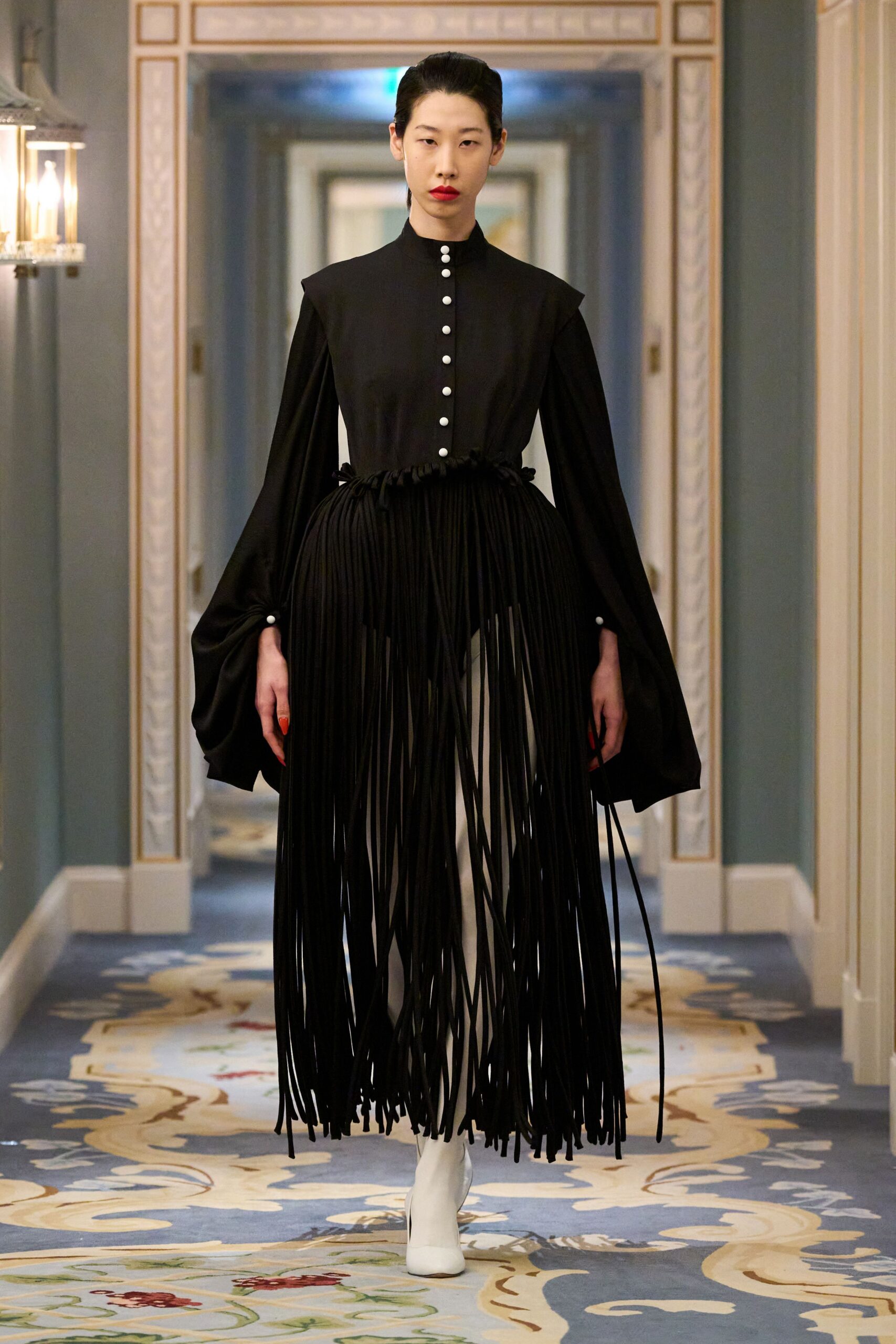 black pleated midi dress with white shoes