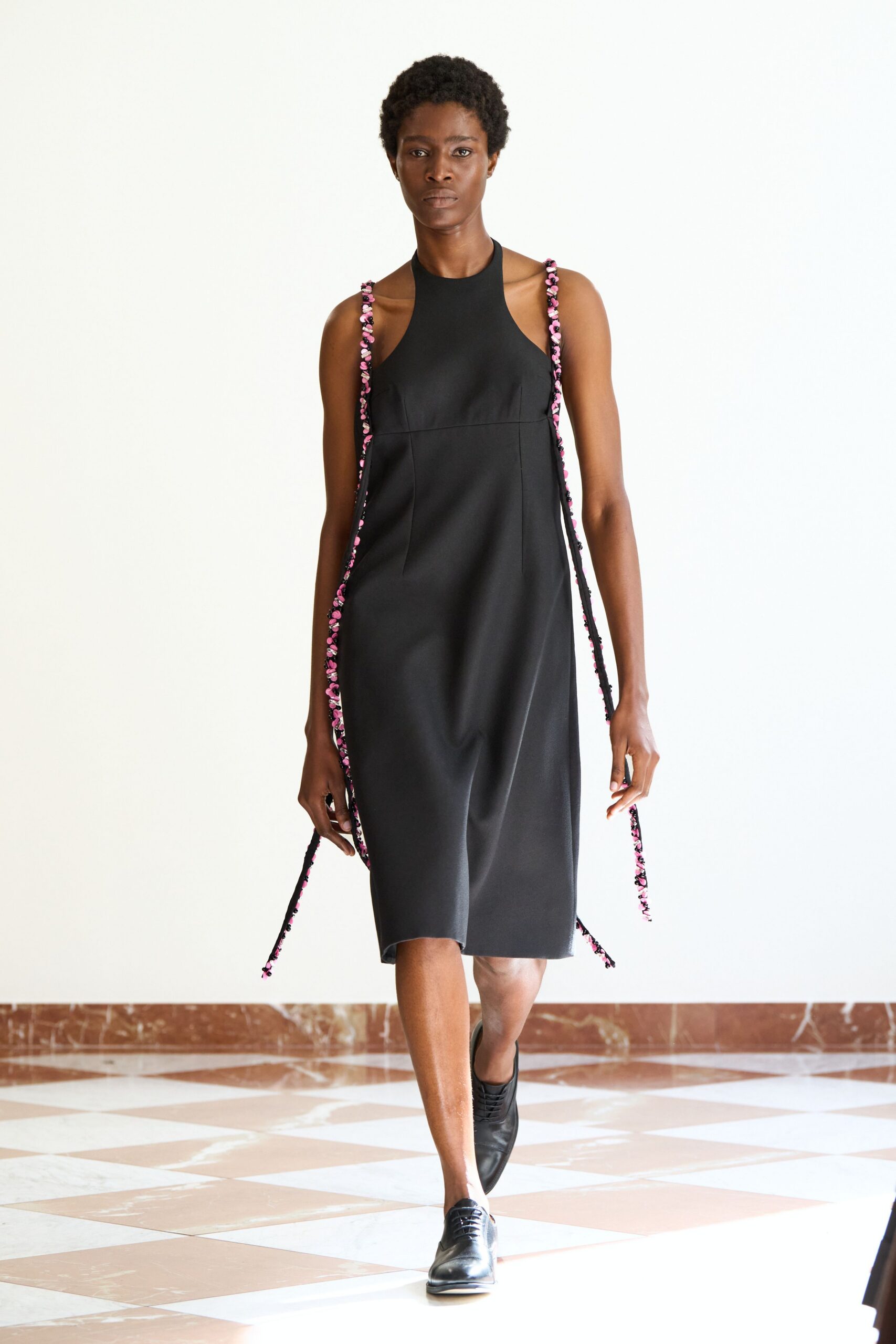 black midi dress with layered details