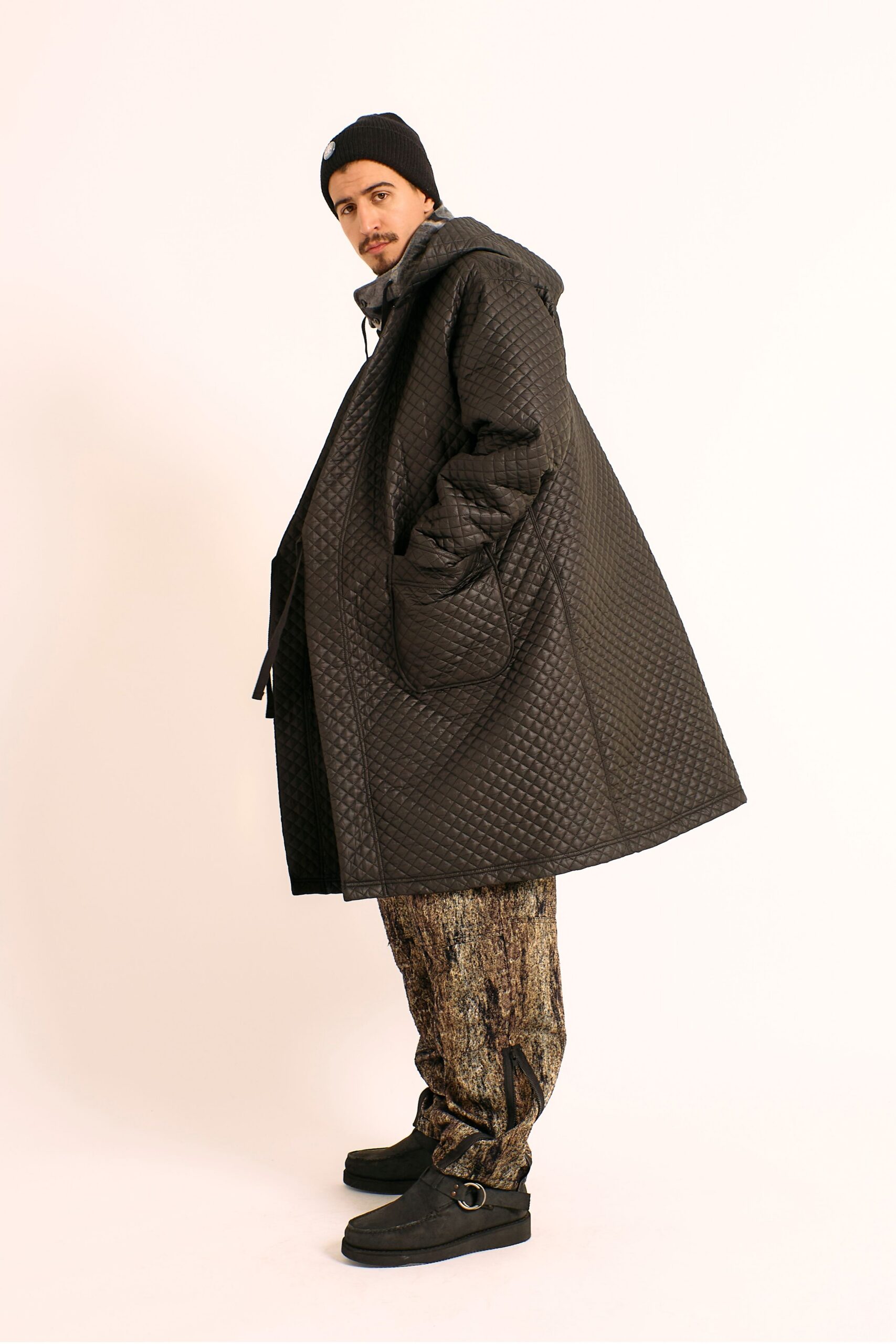 black quilted coat with printed pants