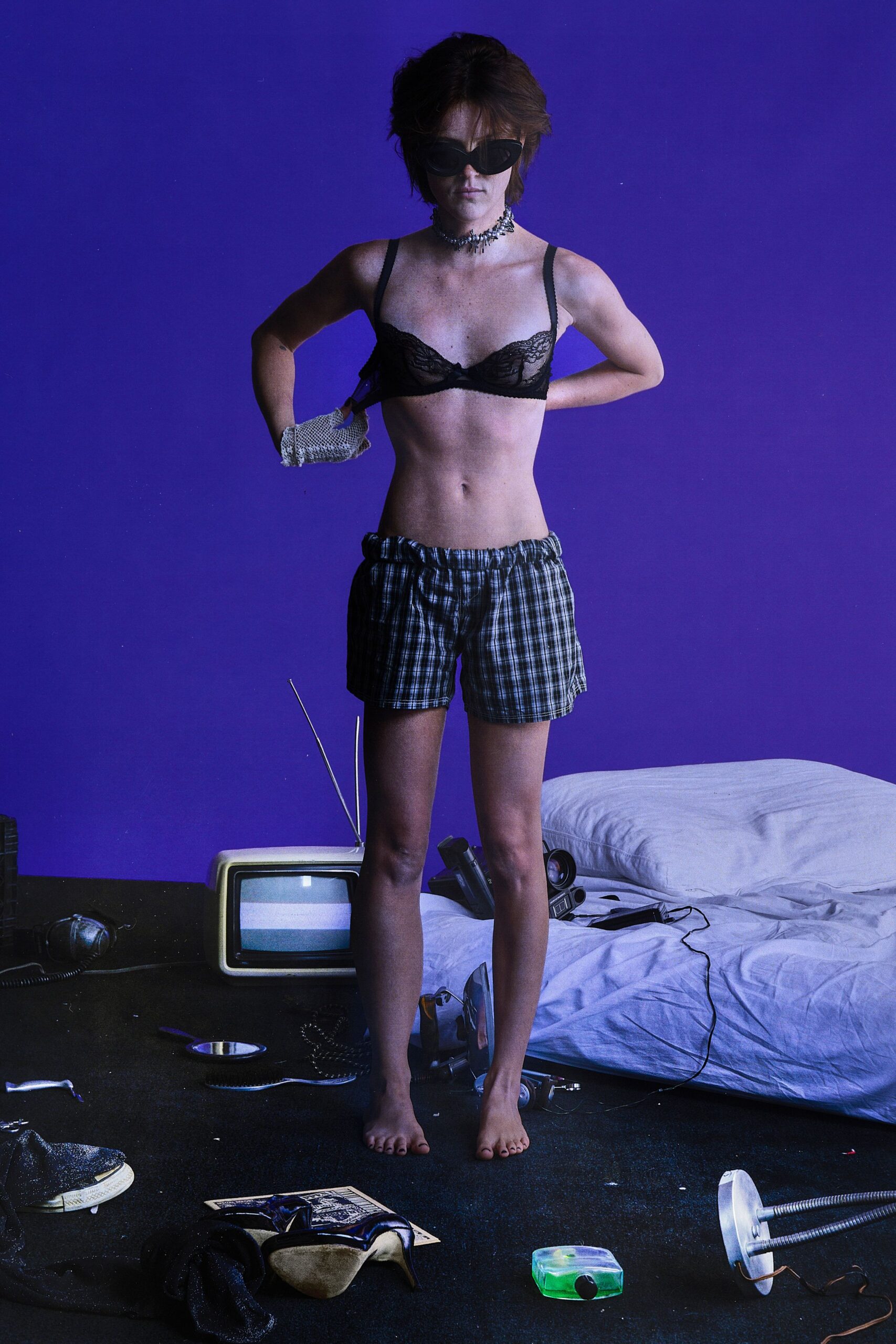 black lace bra and checked shorts