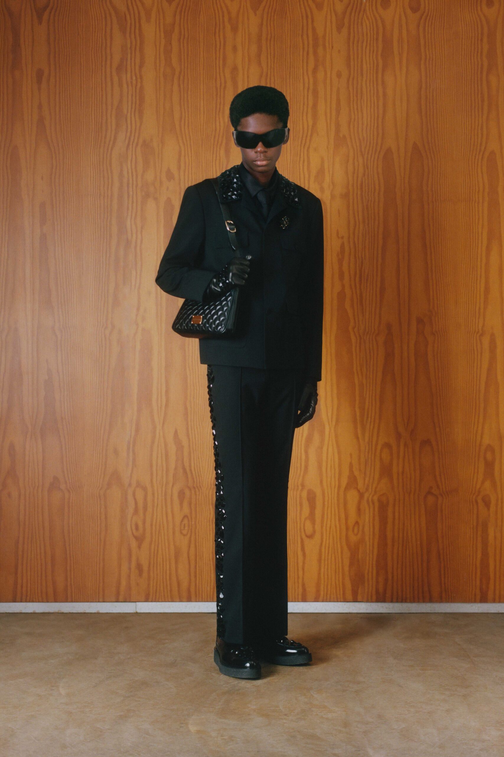black tailored suit with accessories