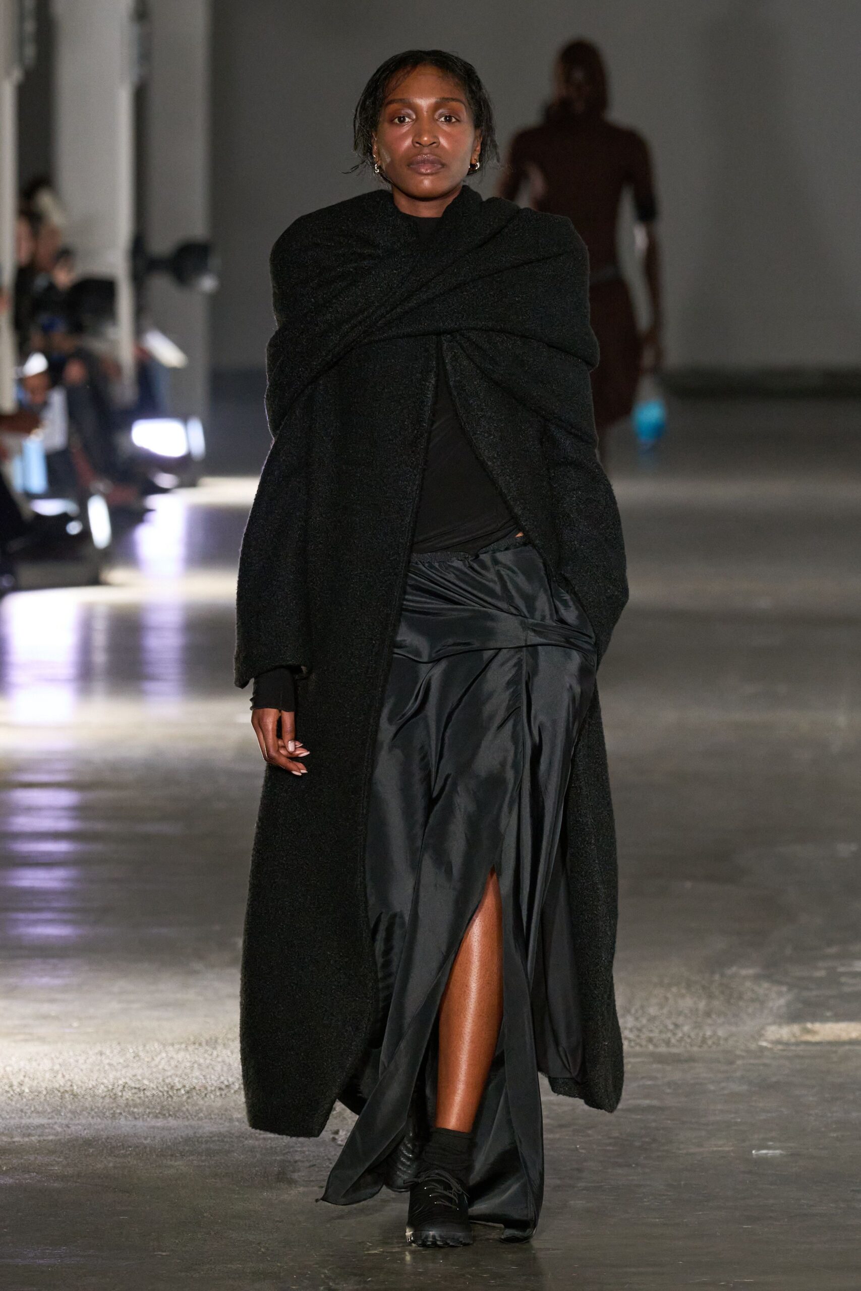 black coat and skirt ensemble