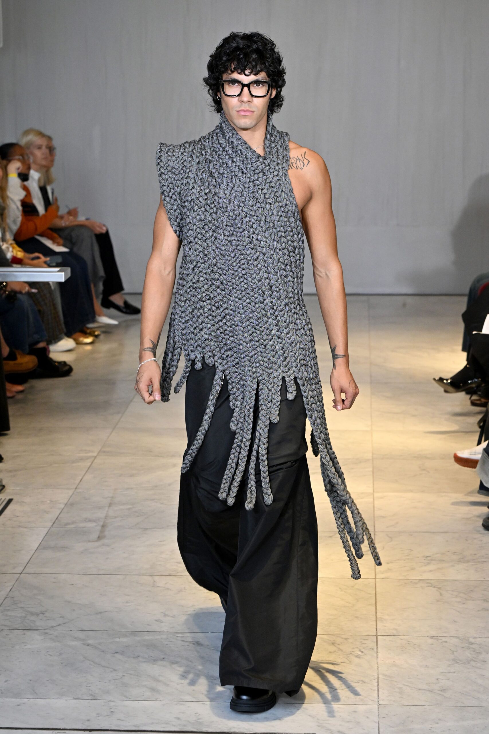 gray relaxed top with black pants