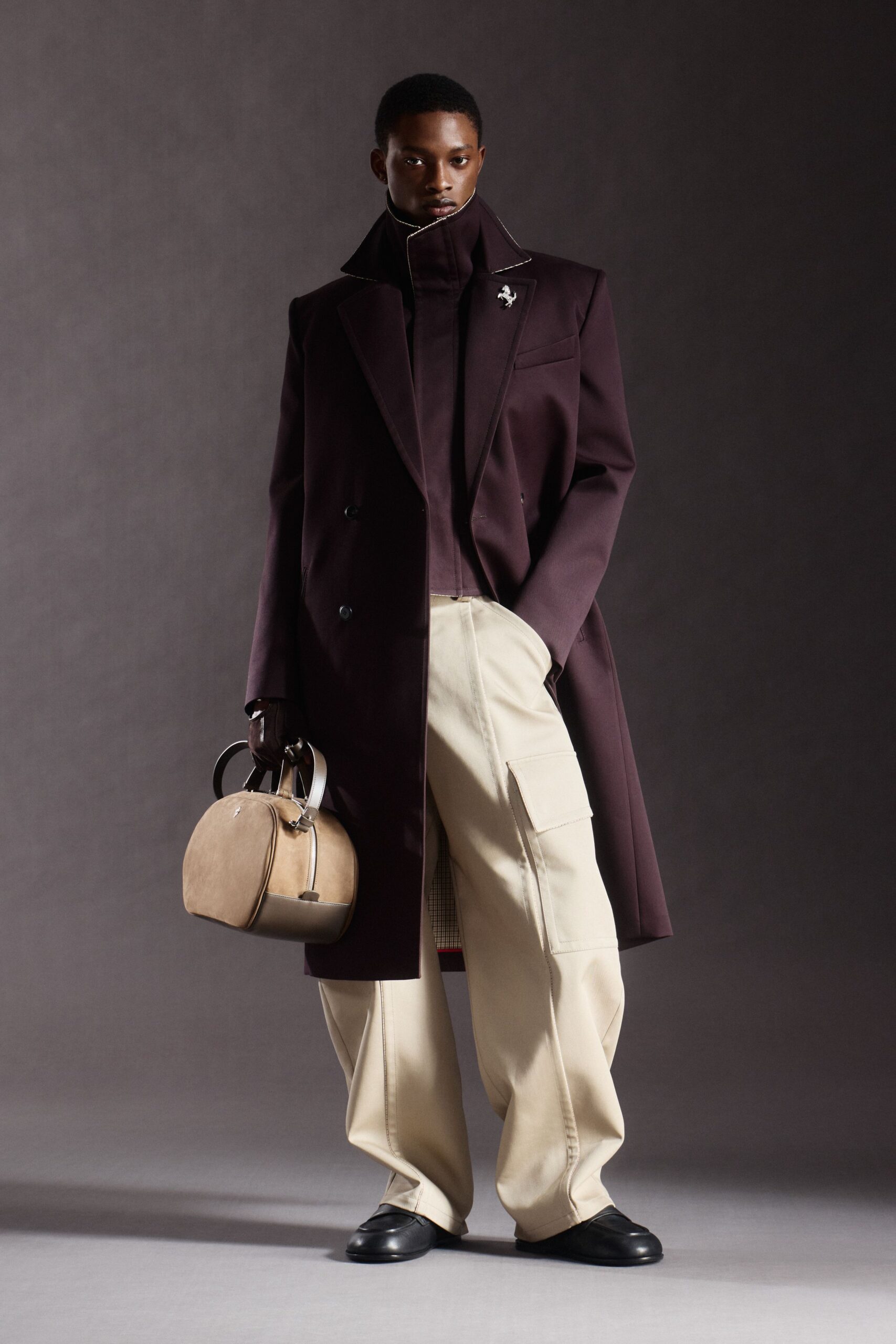 purple wool coat with beige pants