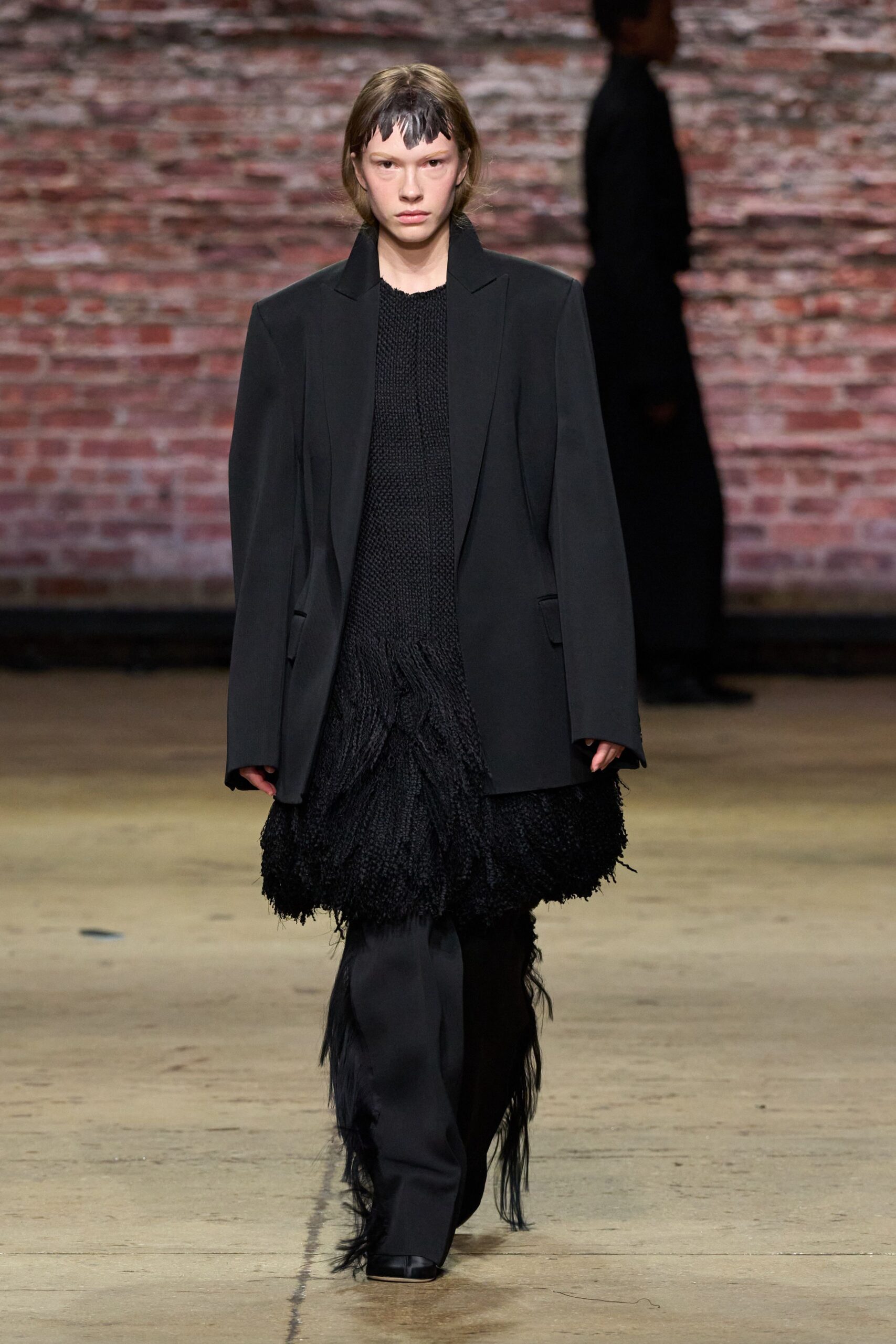 black blazer with fringed top