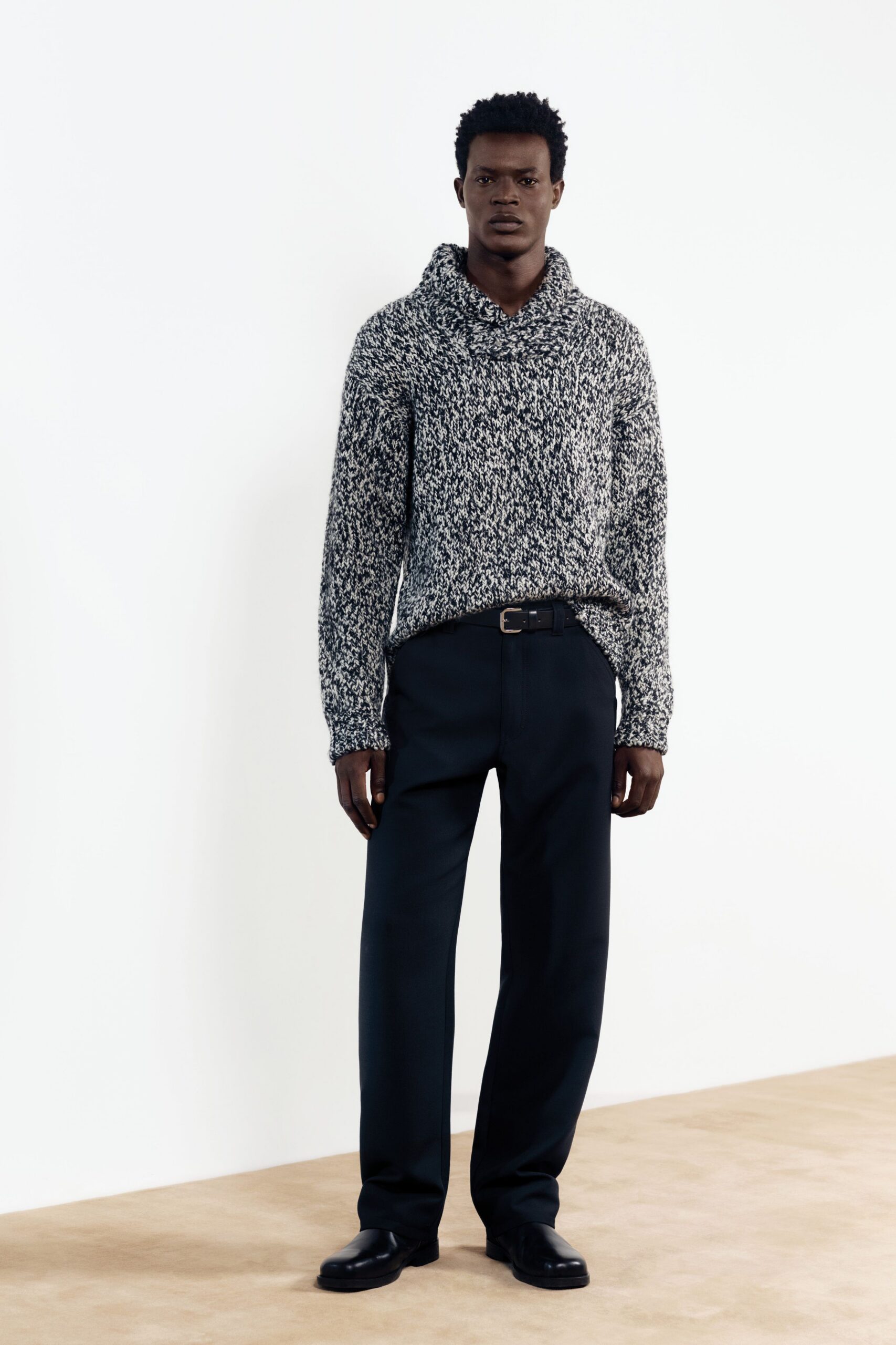 black wool long-sleeve high-neck relaxed textured sweater