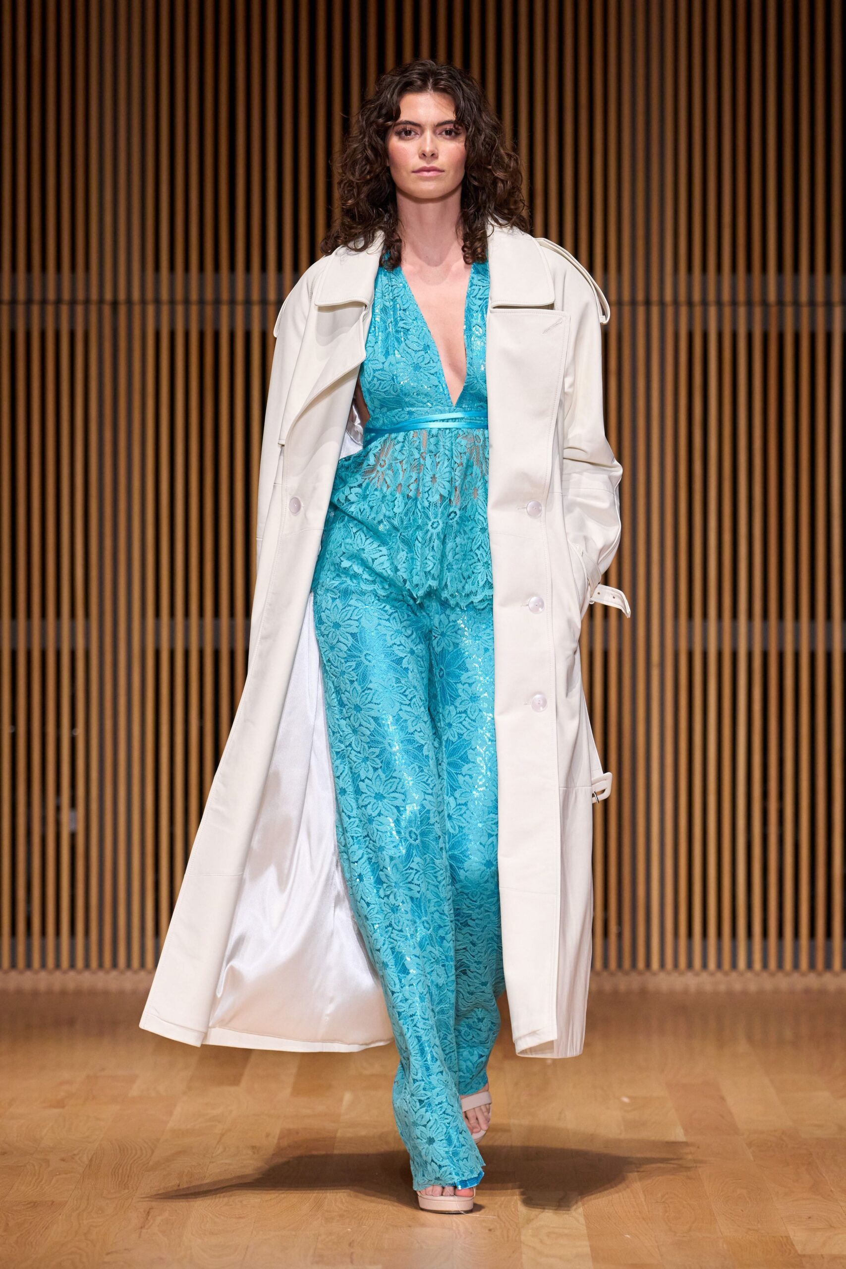 white cotton long-sleeve collared relaxed buttoned trench
