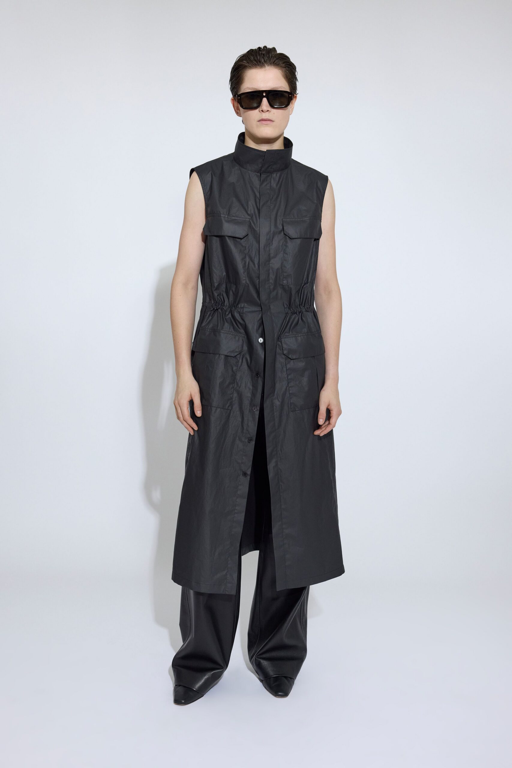 black vinyl sleeveless dress