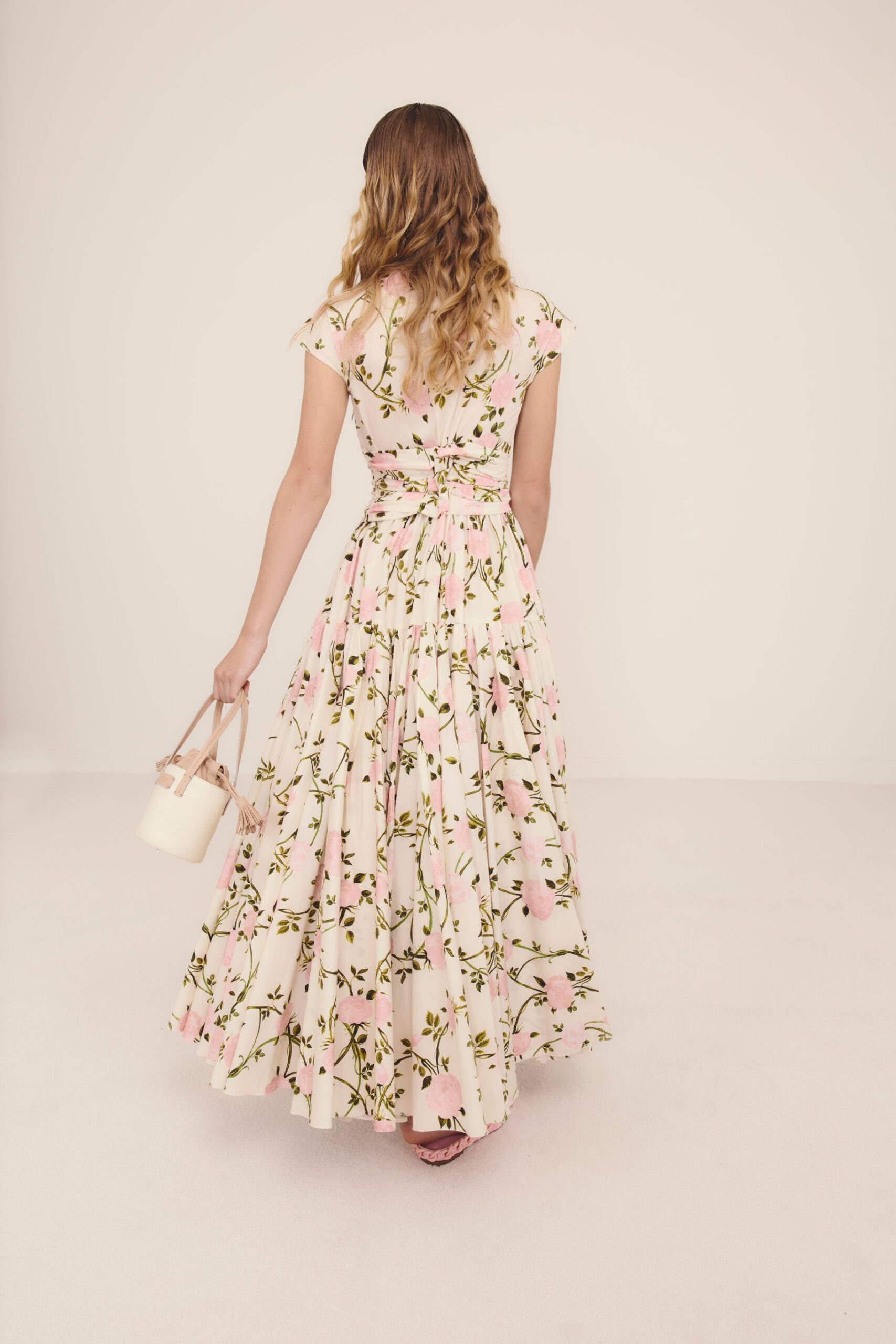 pink cotton short-sleeve v-neck fitted floral tiered dress