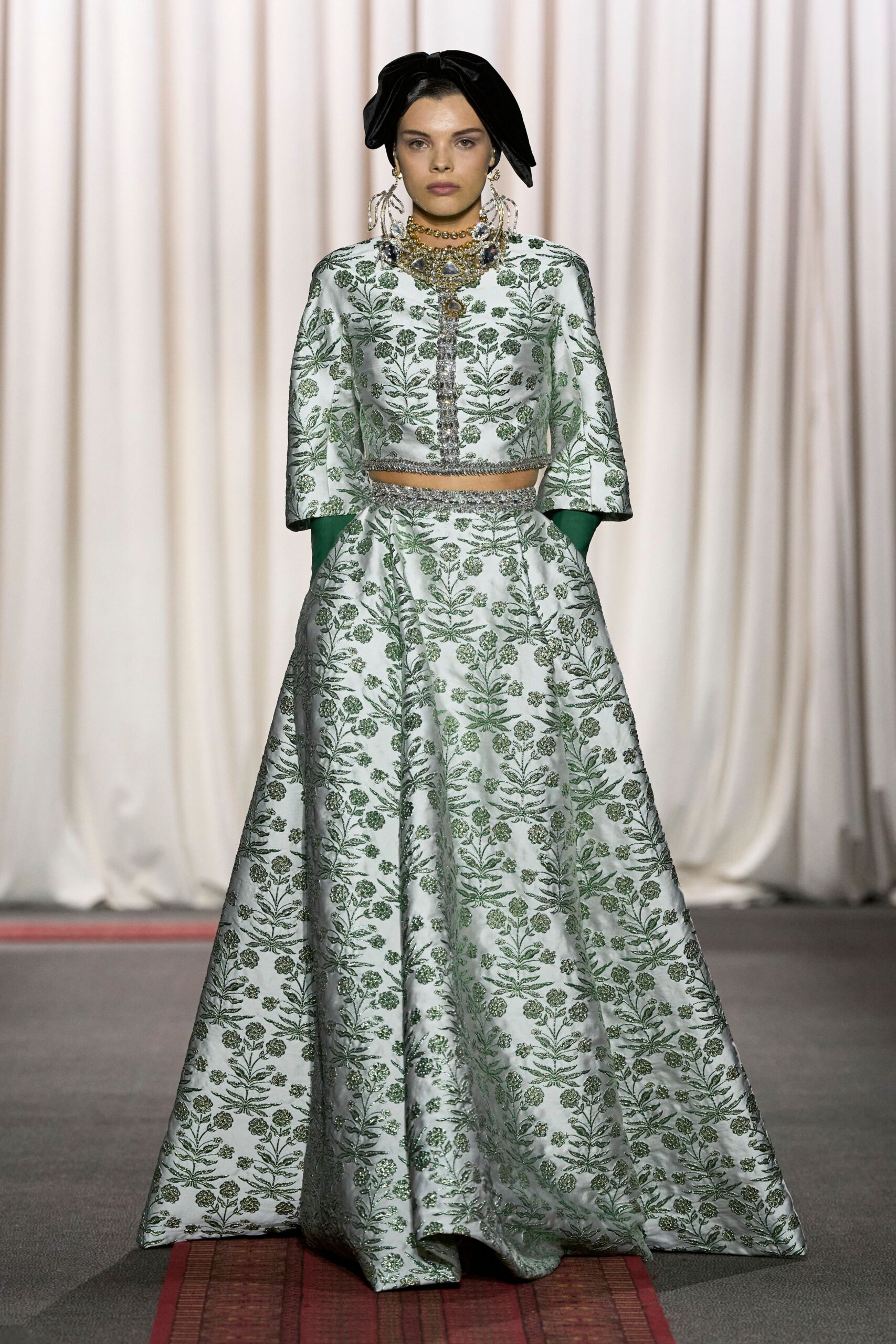 embroidered green and white gown