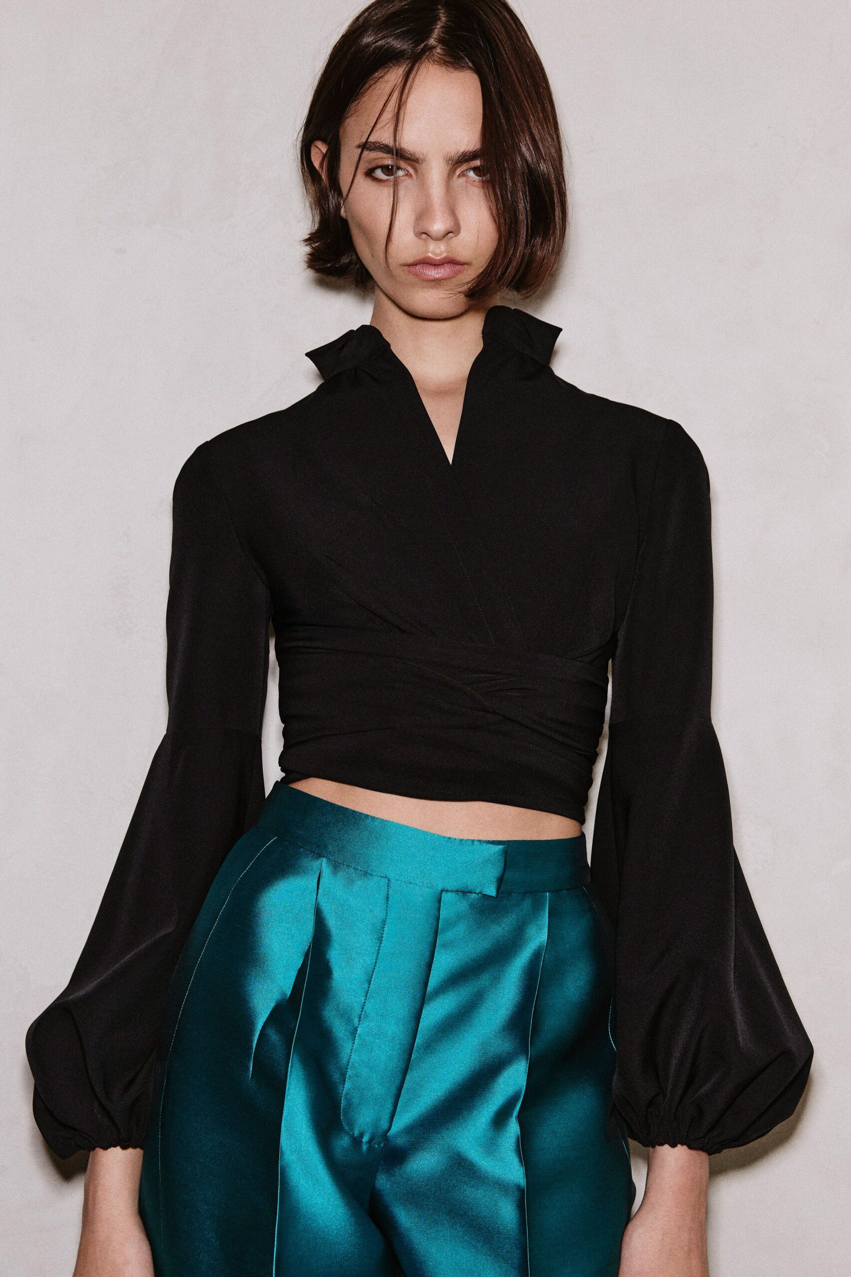 black silk long-sleeve collared fitted pleated cropped top