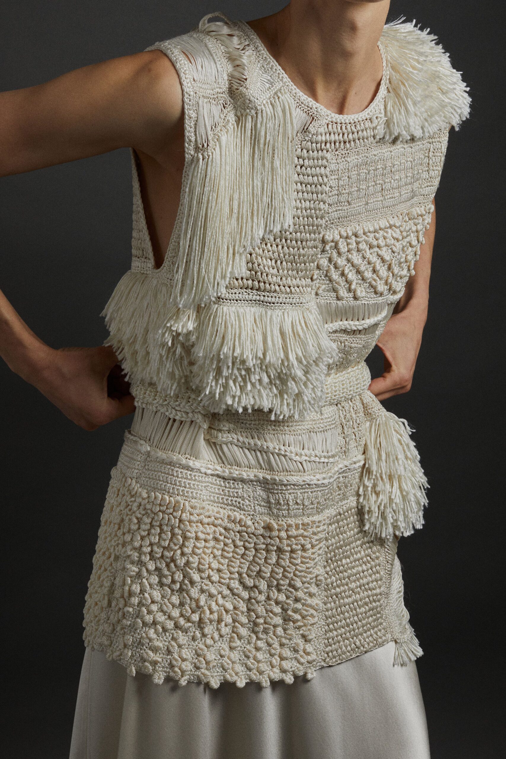 white fringed top and skirt