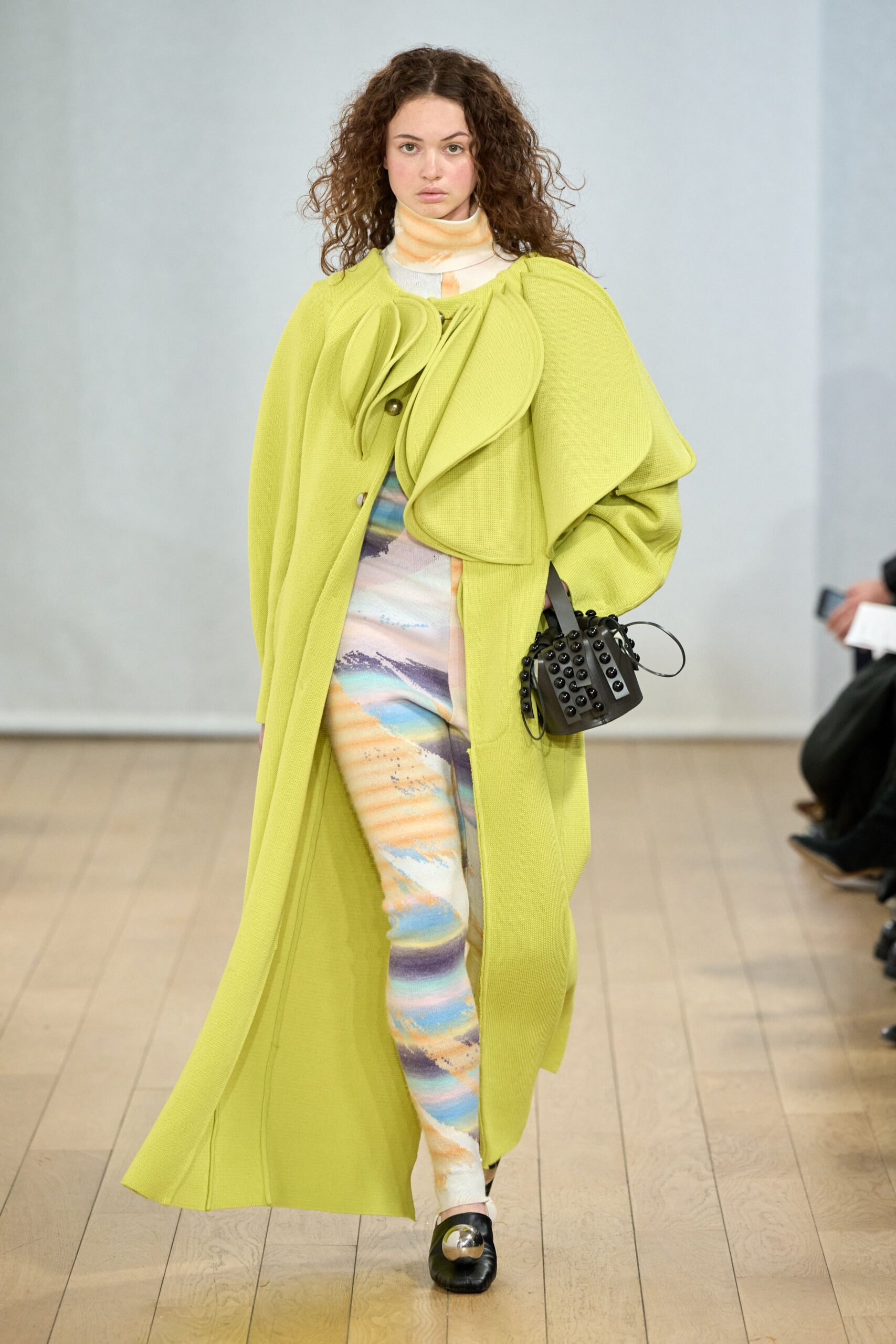 green wool cape with printed pants
