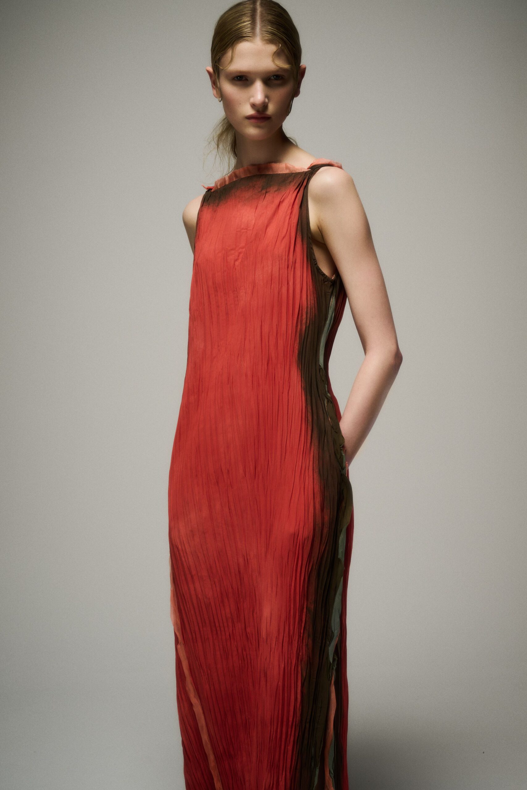 red pleated silk gown