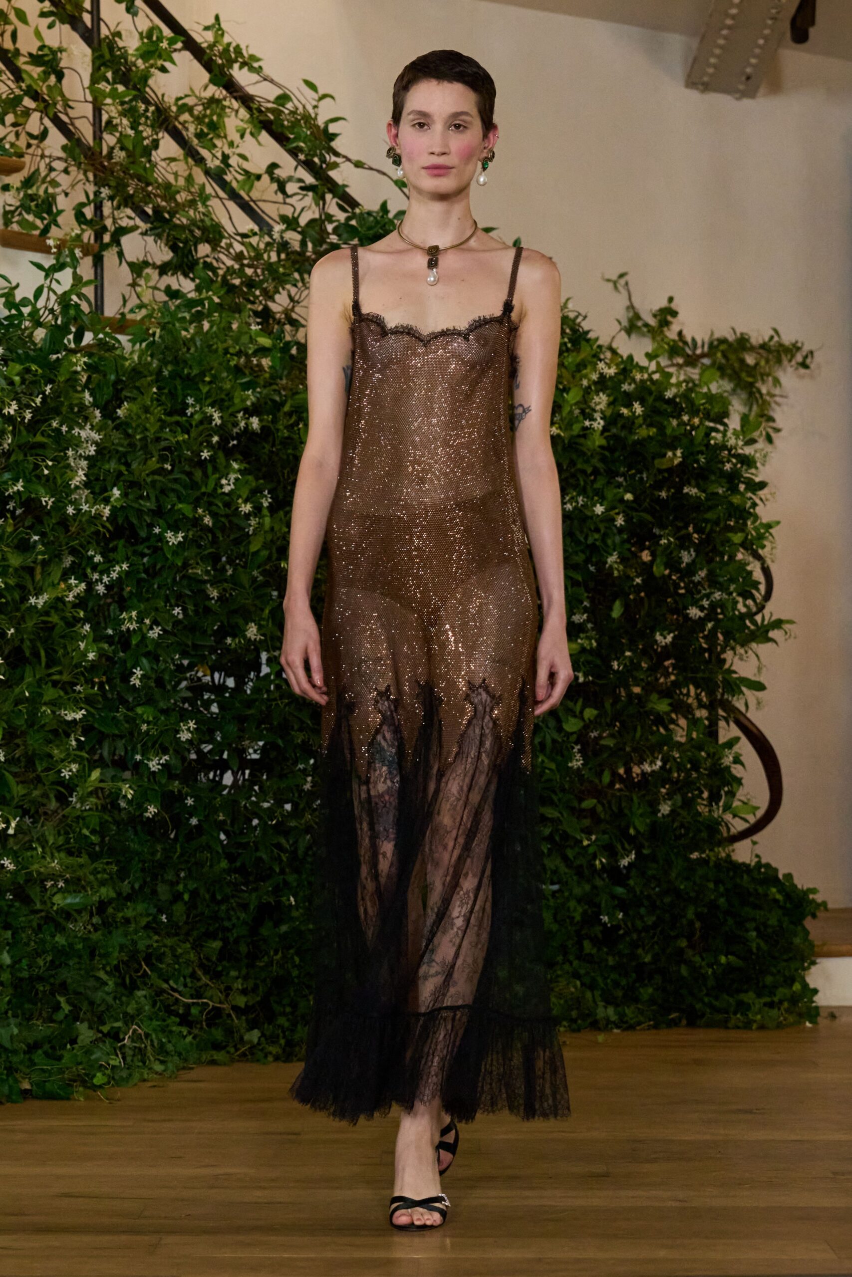 black silk sleeveless v-neck fitted ruffled gown
