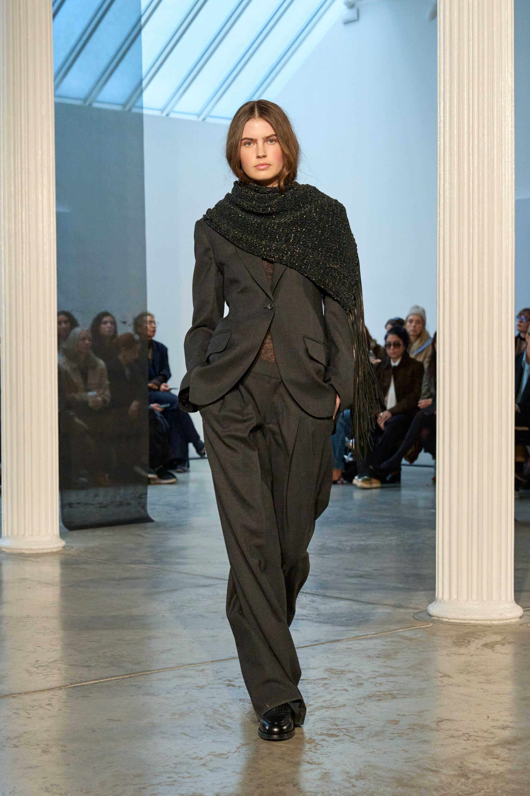 black tailored suit with scarf
