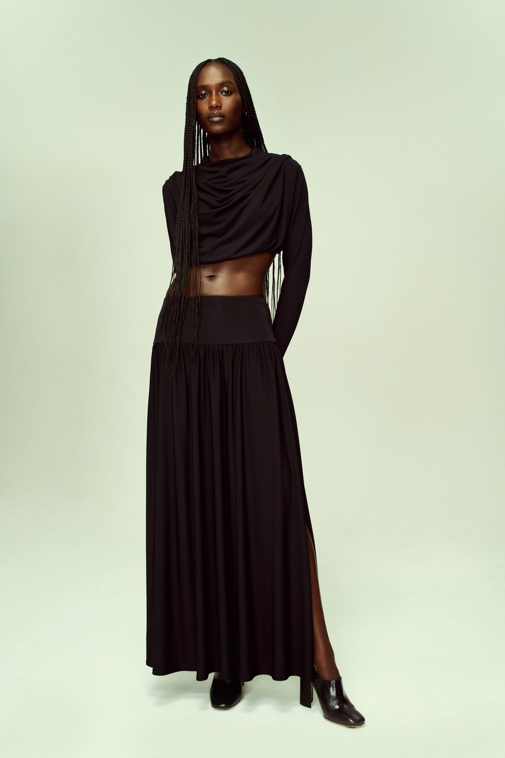 black fitted top and maxi skirt