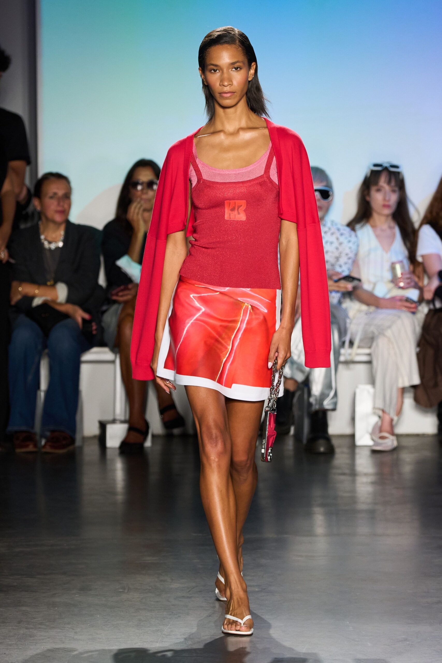 red fitted top with flared mini skirt