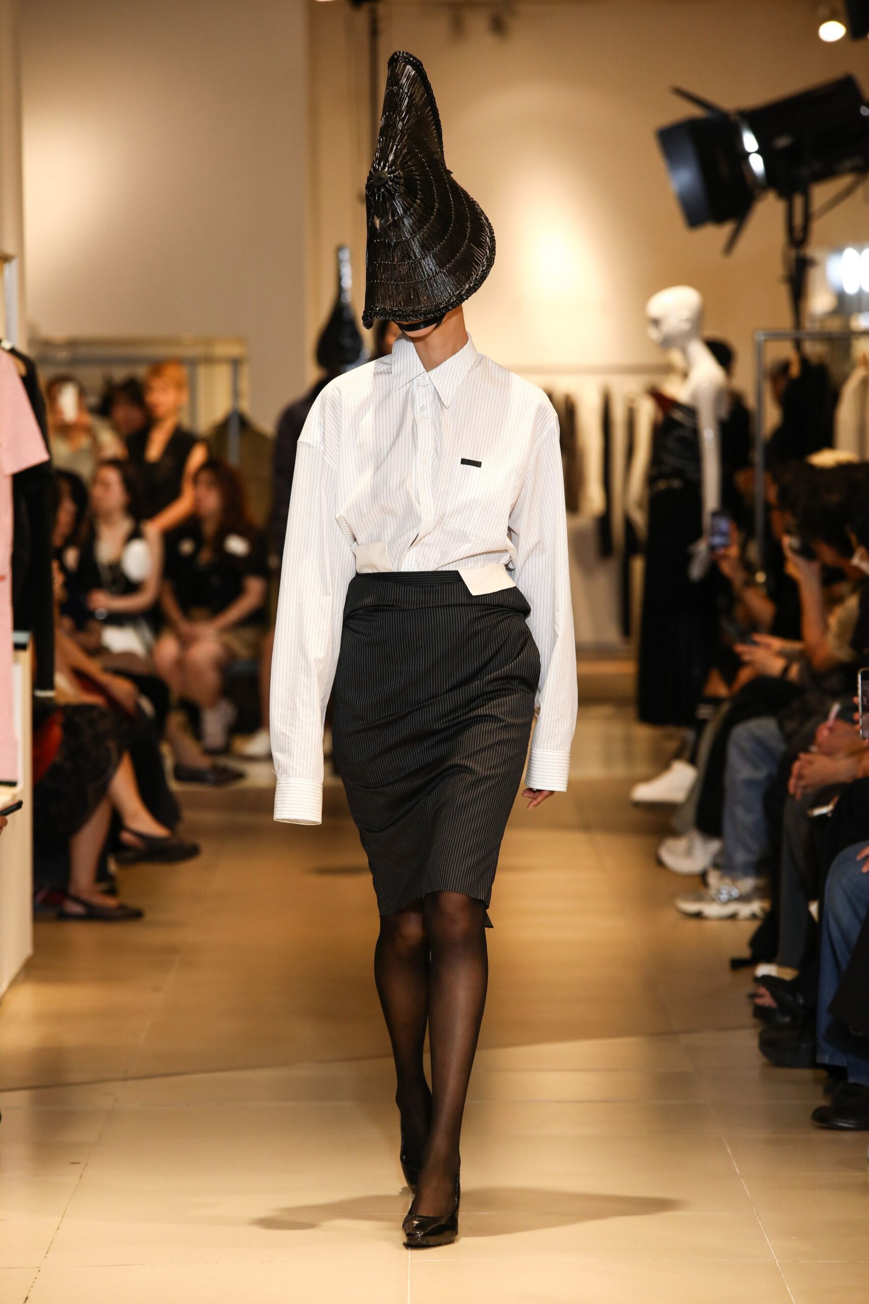 white cotton long-sleeve collared oversized buttoned shirt