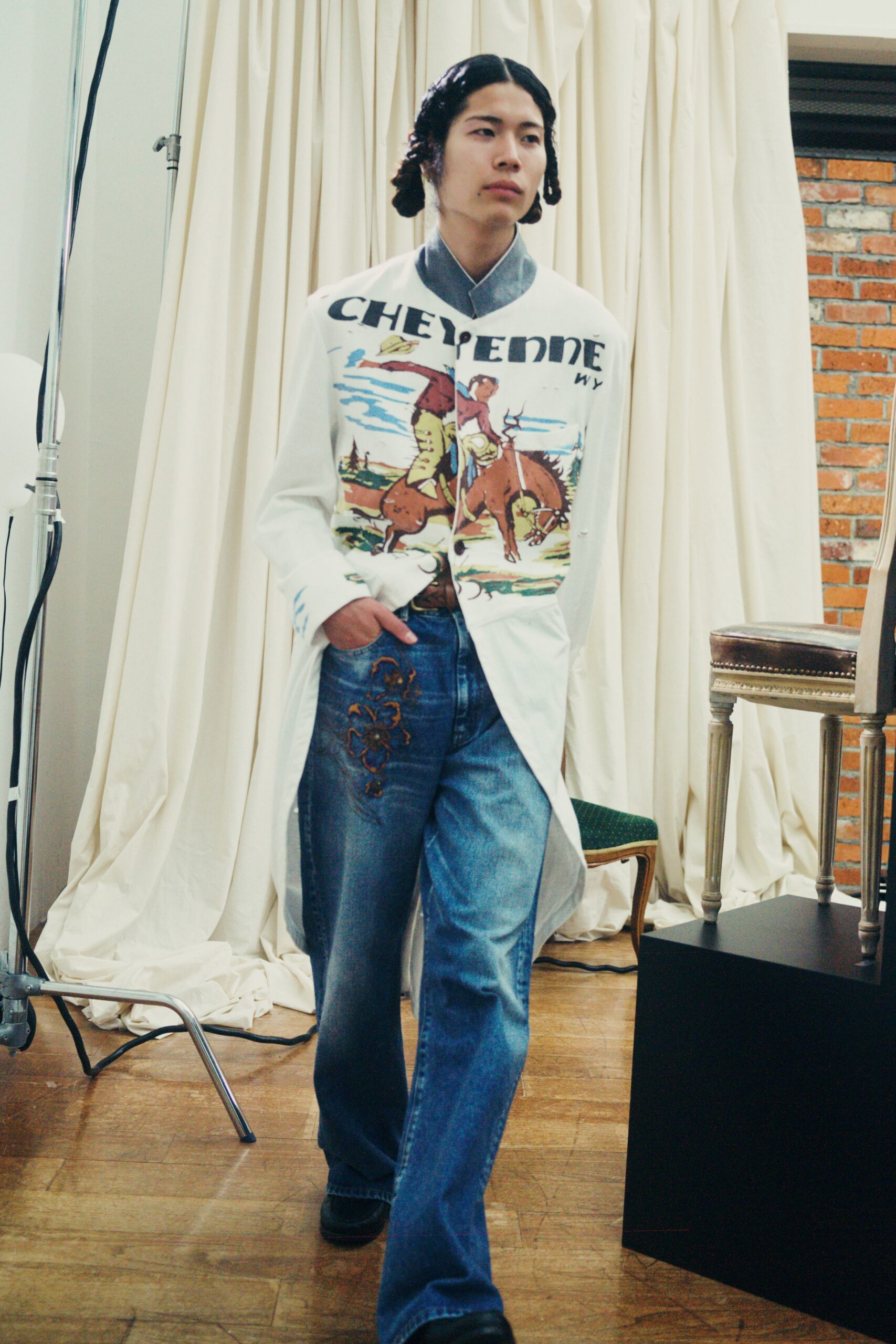 white printed shirt with blue jeans