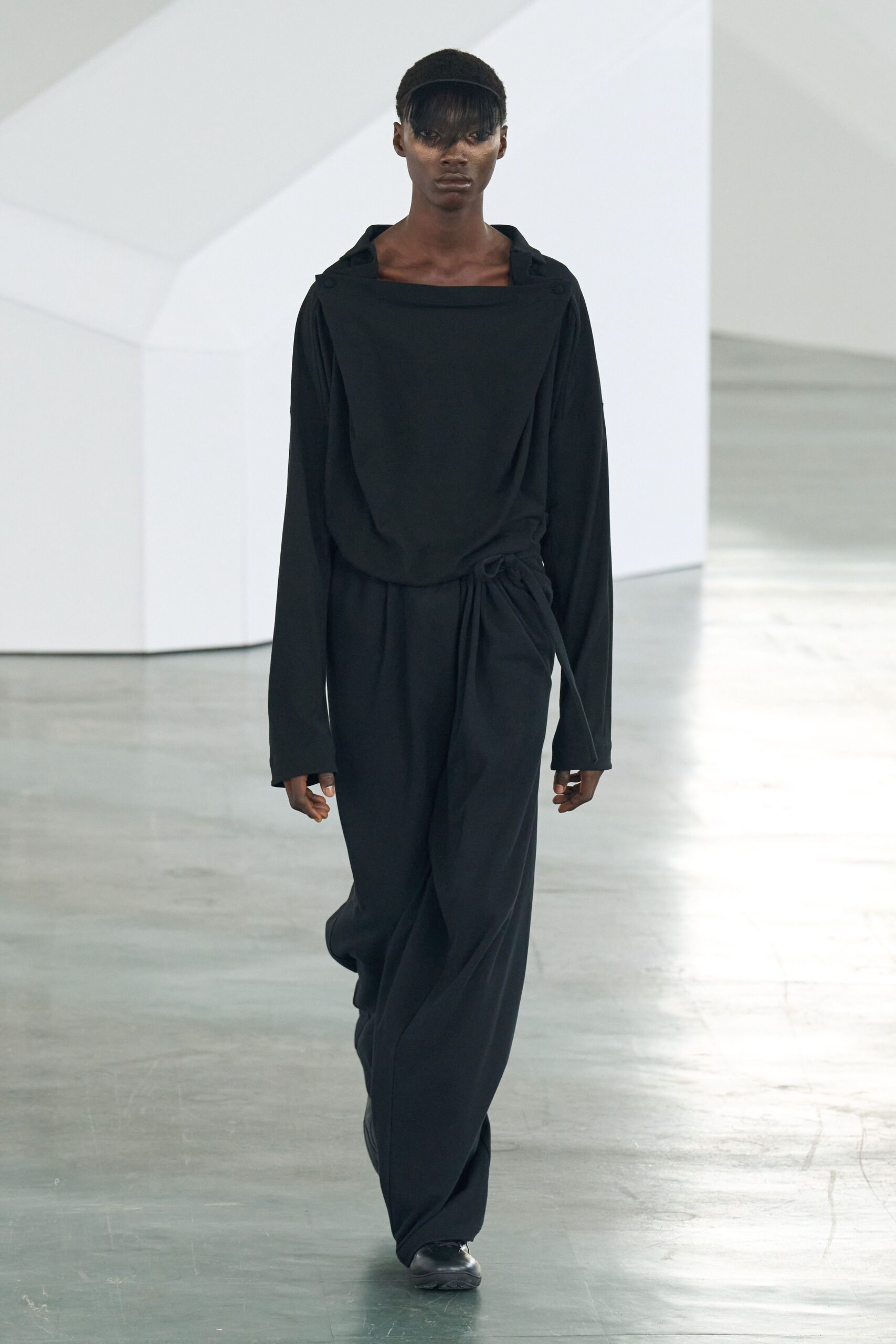 black relaxed jumpsuit with shoes