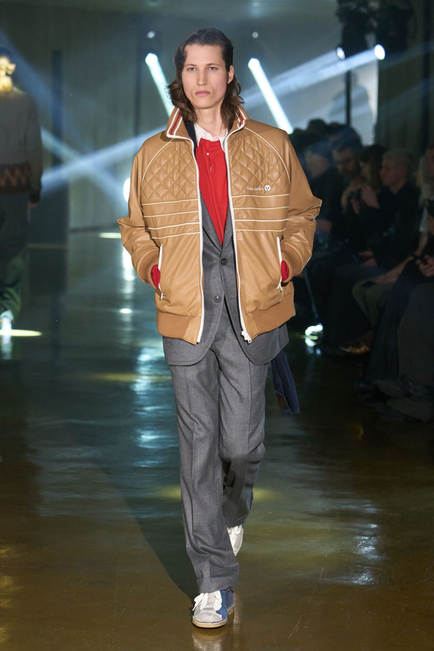 brown quilted jacket with gray suit