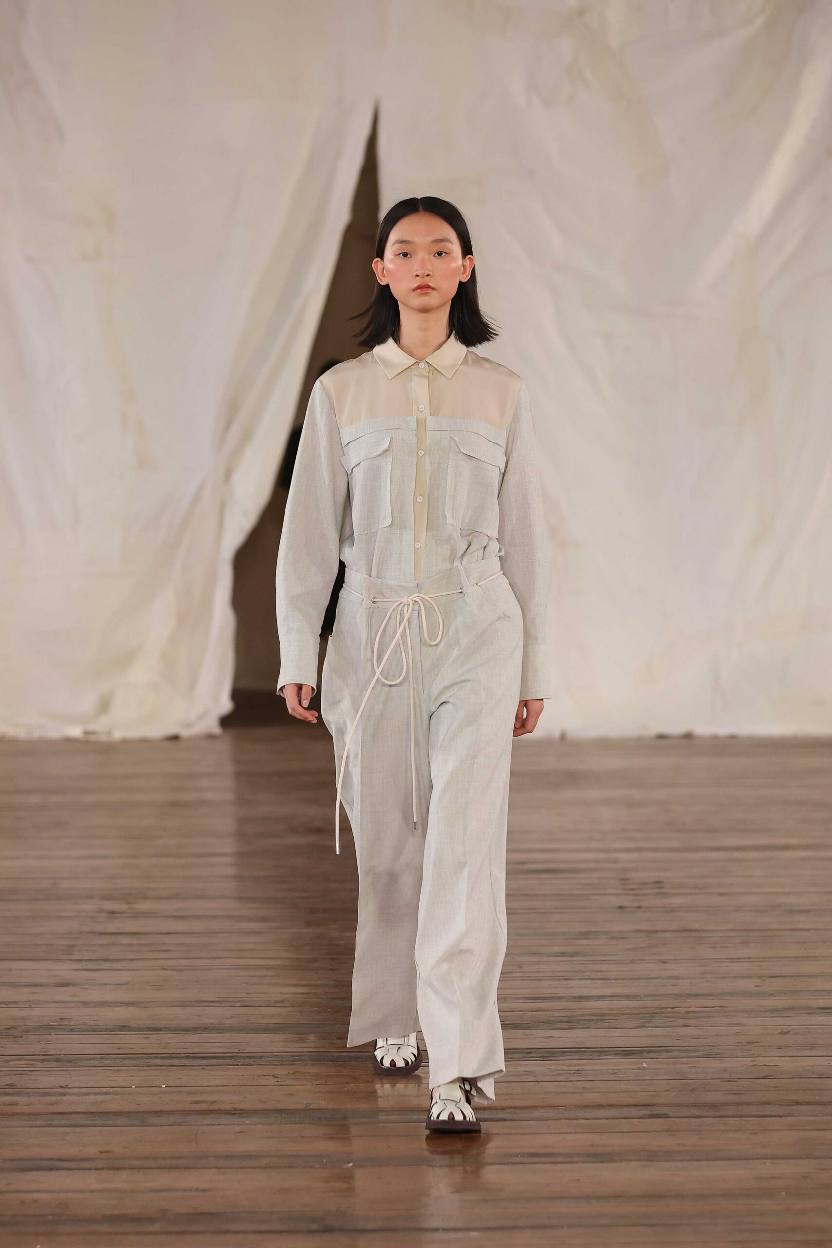 white gray relaxed jumpsuit with shoes