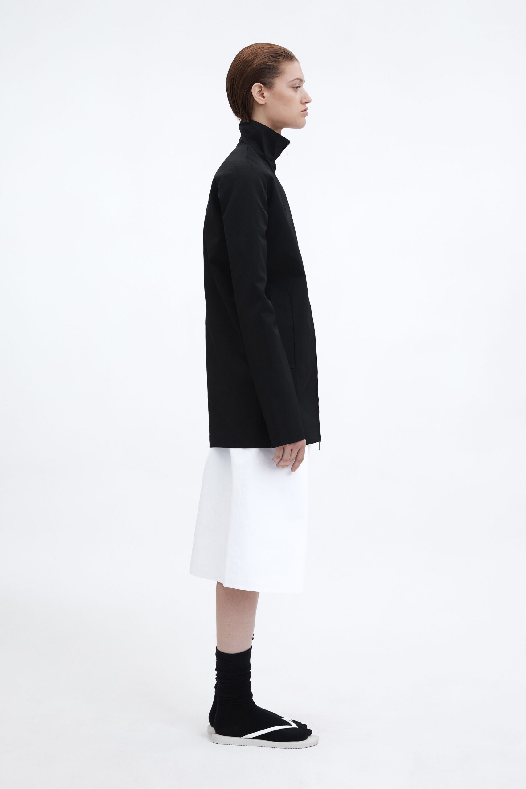 black fitted jacket white midi skirt