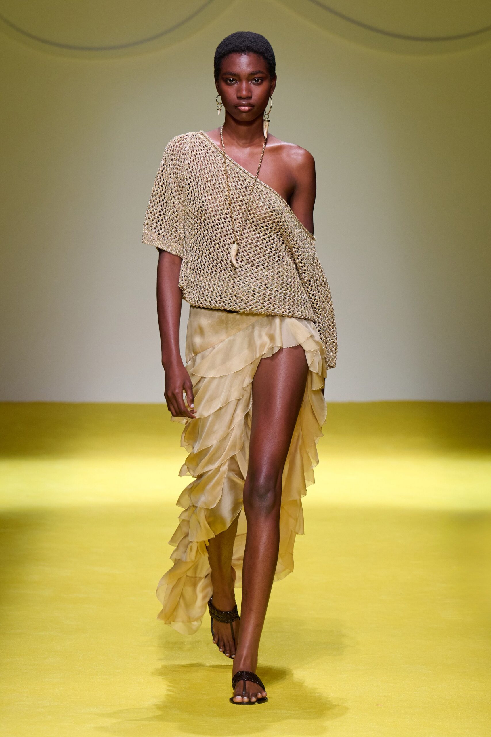 gold relaxed top with yellow tiered skirt