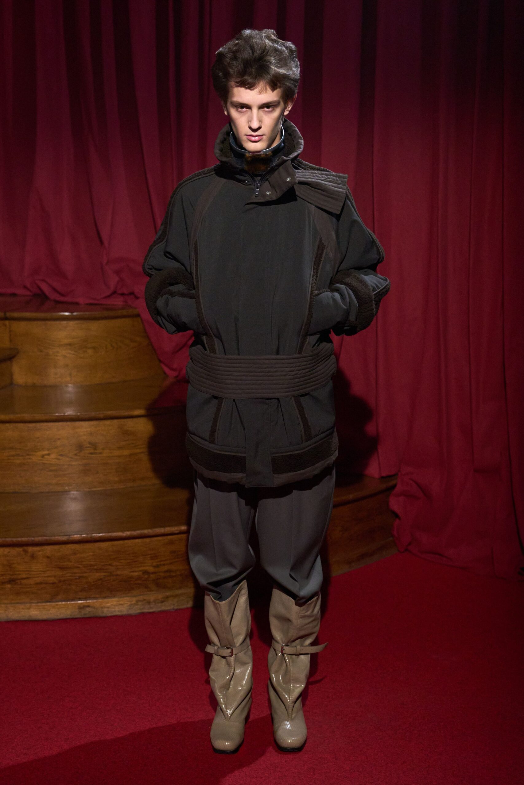 black coat gray pants beige boots