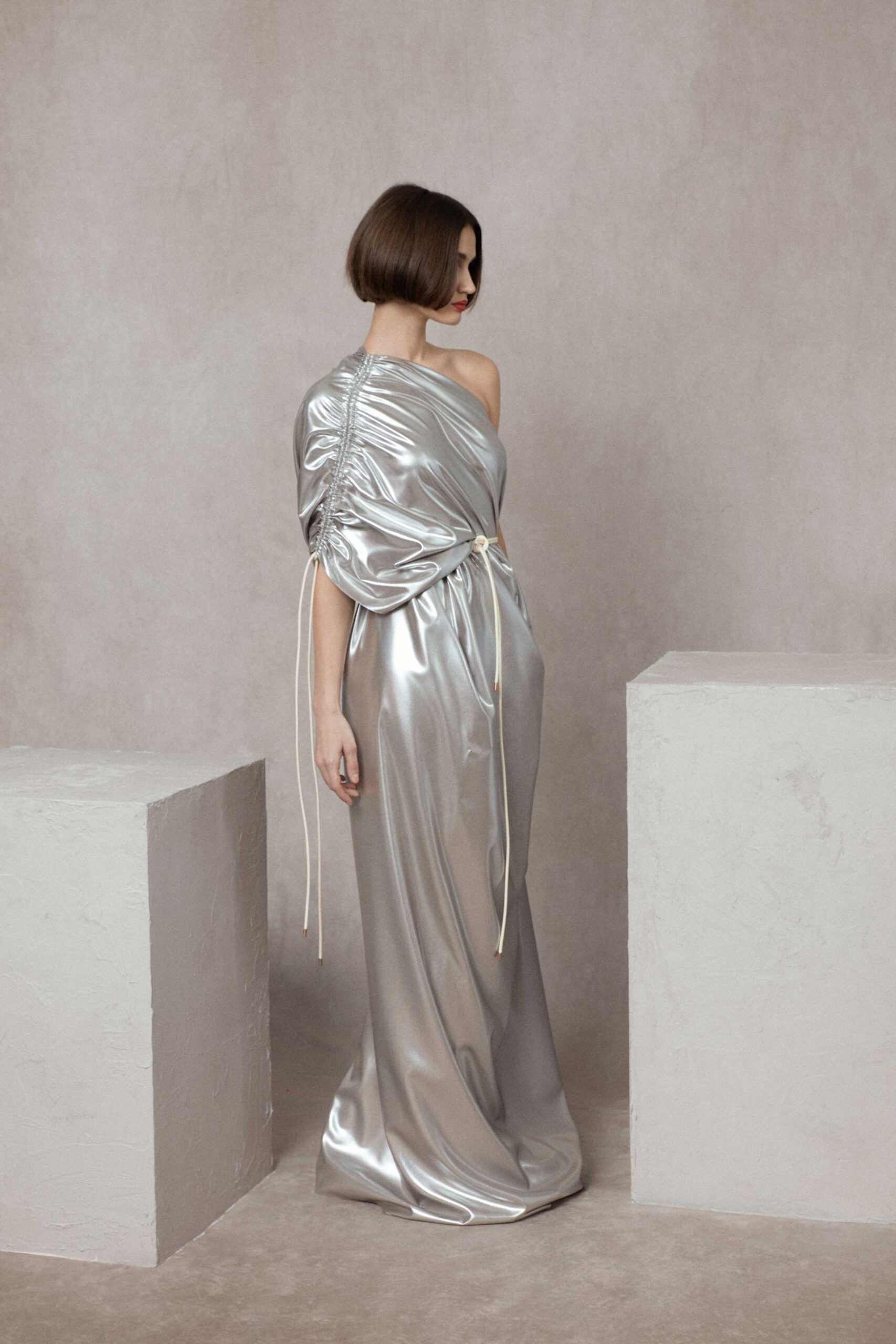 silver satin off-shoulder gown