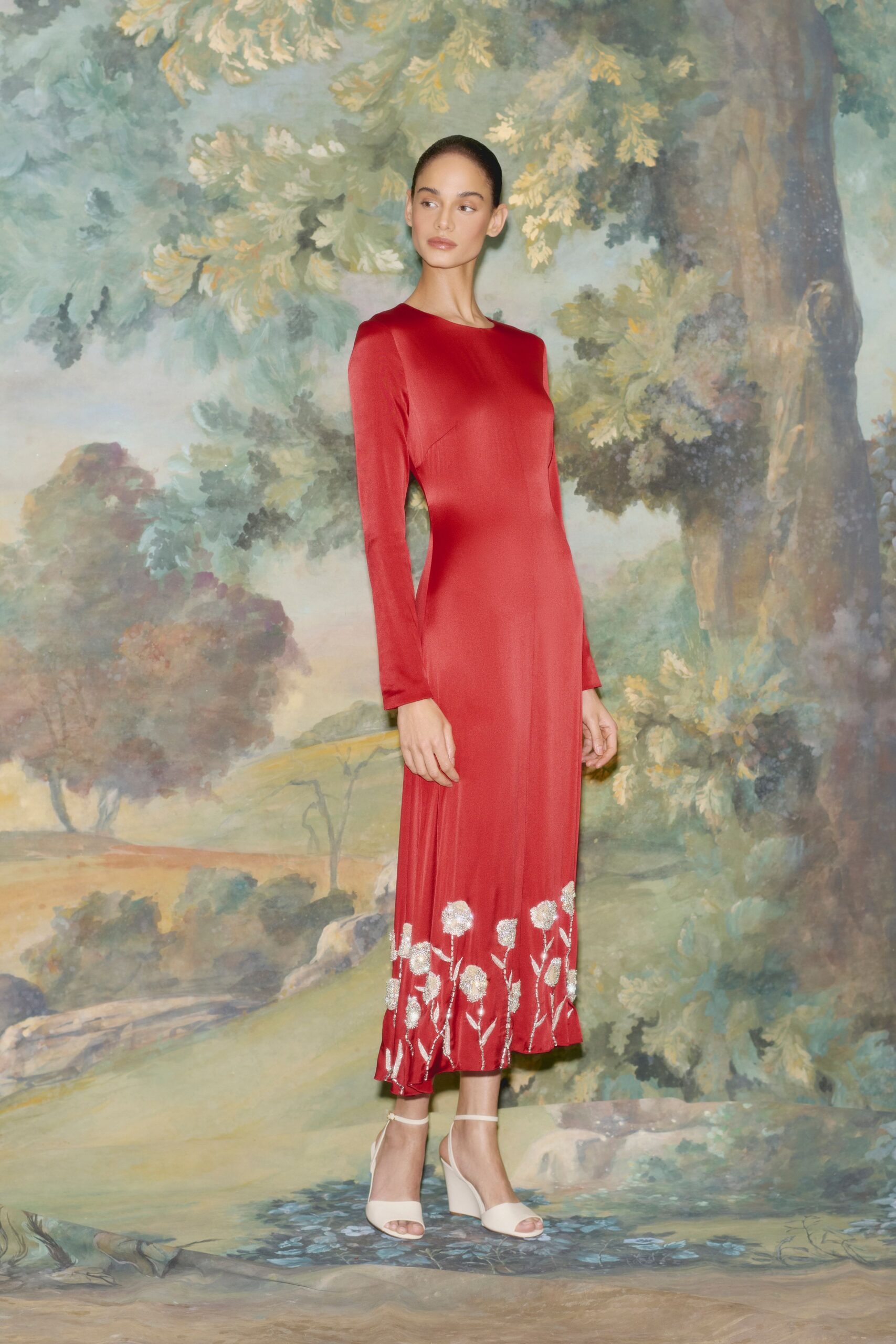 red silk fitted gown with embroidery