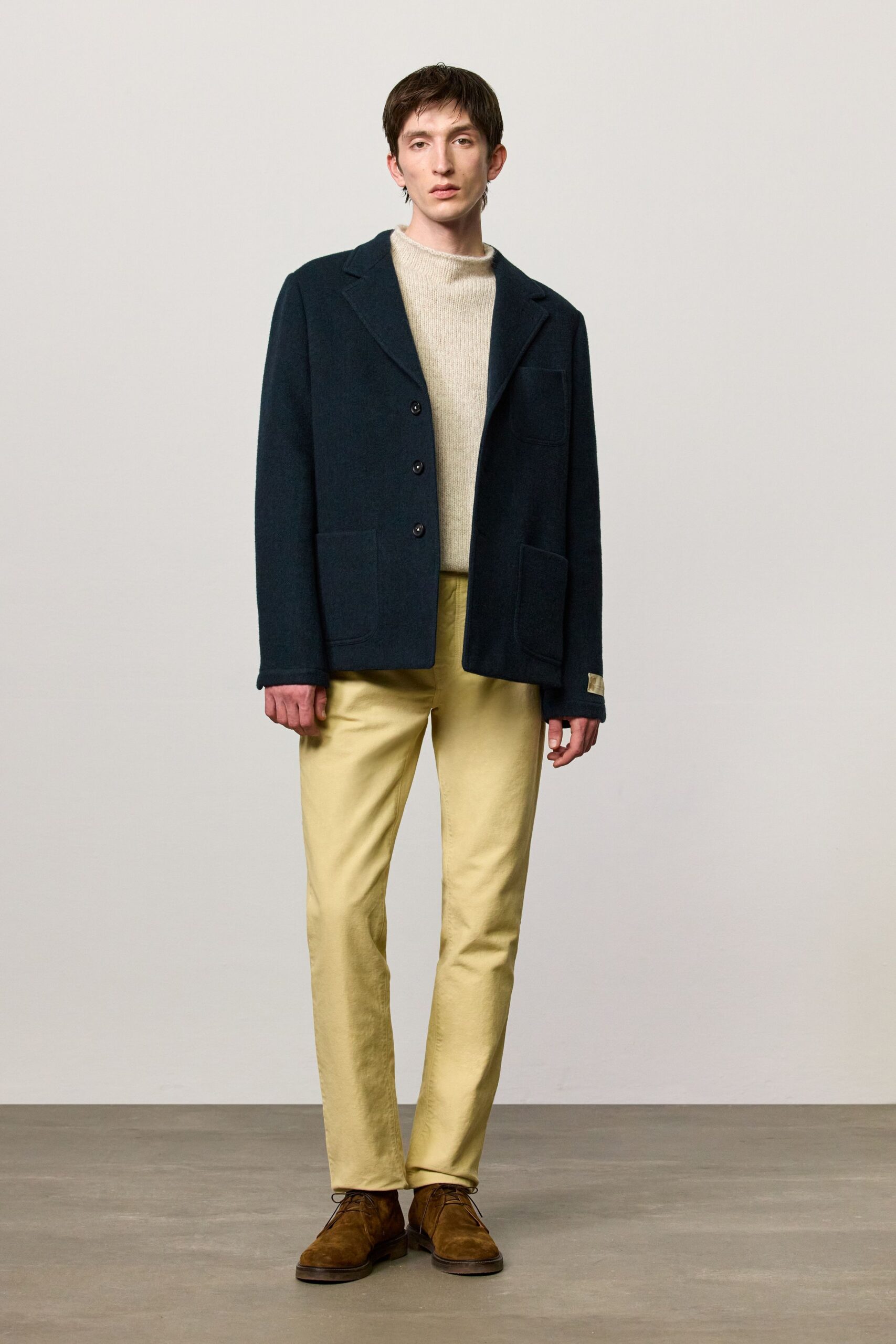 blue wool long-sleeve collared structured buttoned jacket