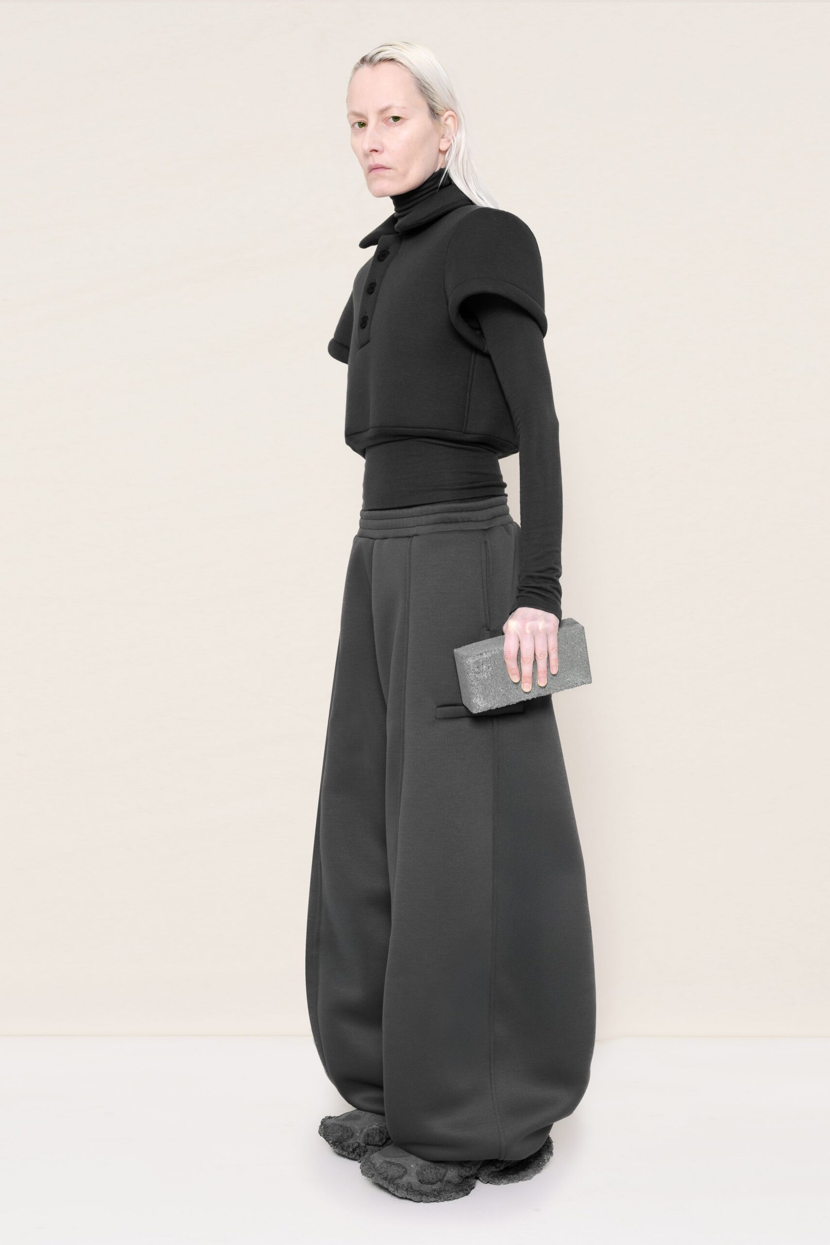 black fitted top and relaxed pants