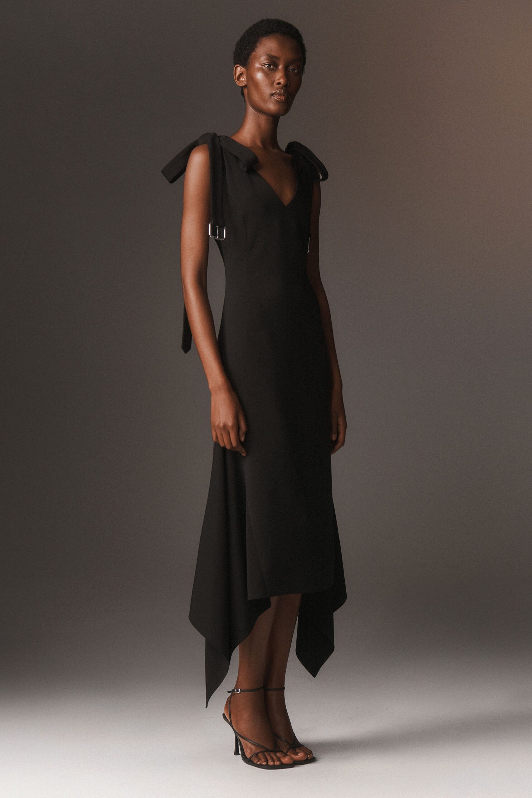 black silk sleeveless v-neck fitted midi dress