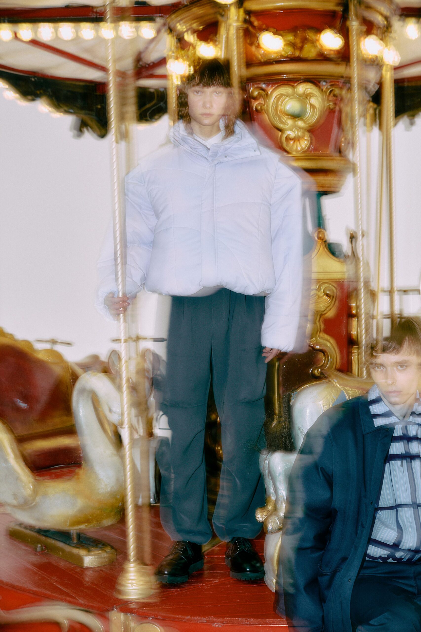 white relaxed jacket gray pants