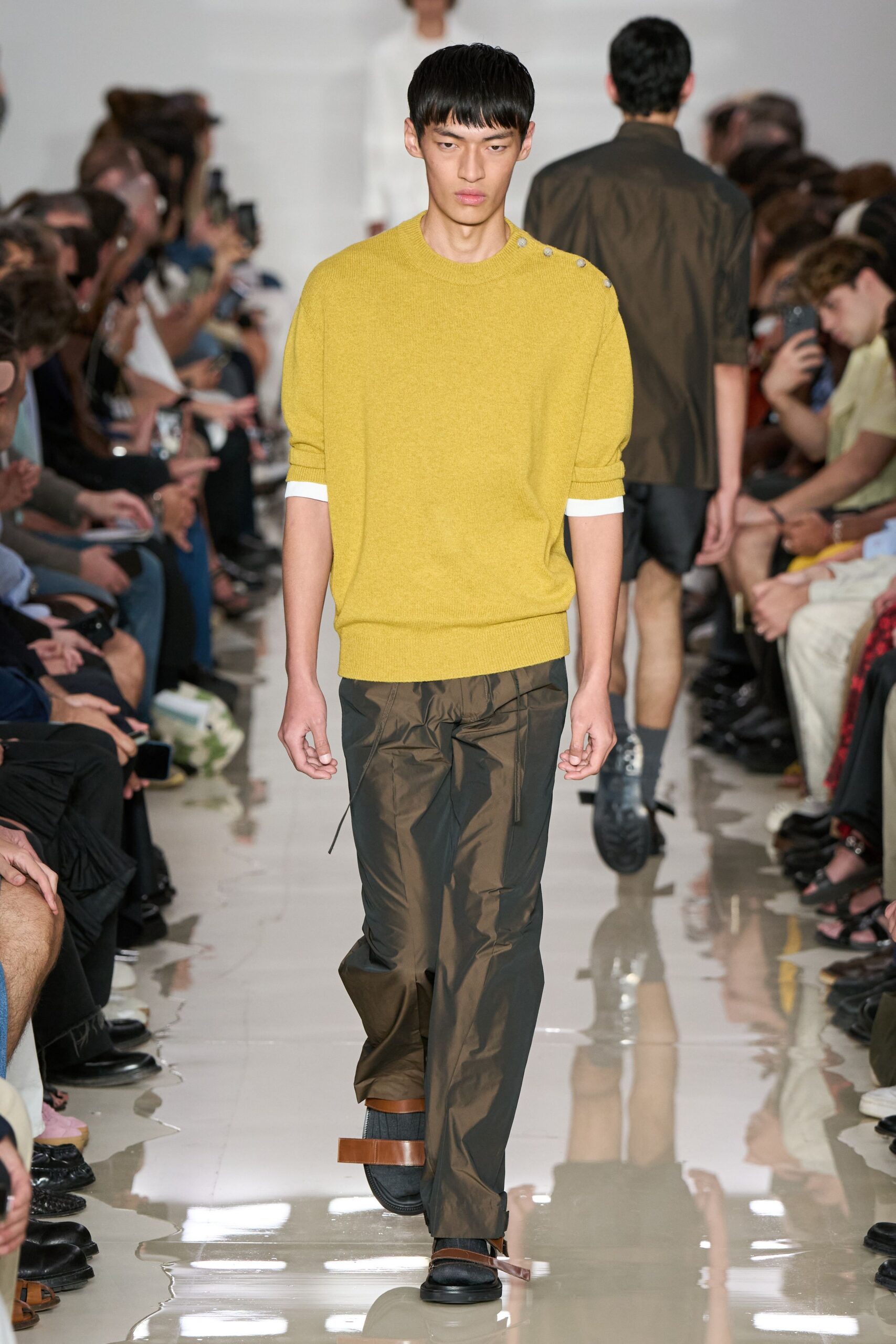 yellow relaxed sweater with brown pants