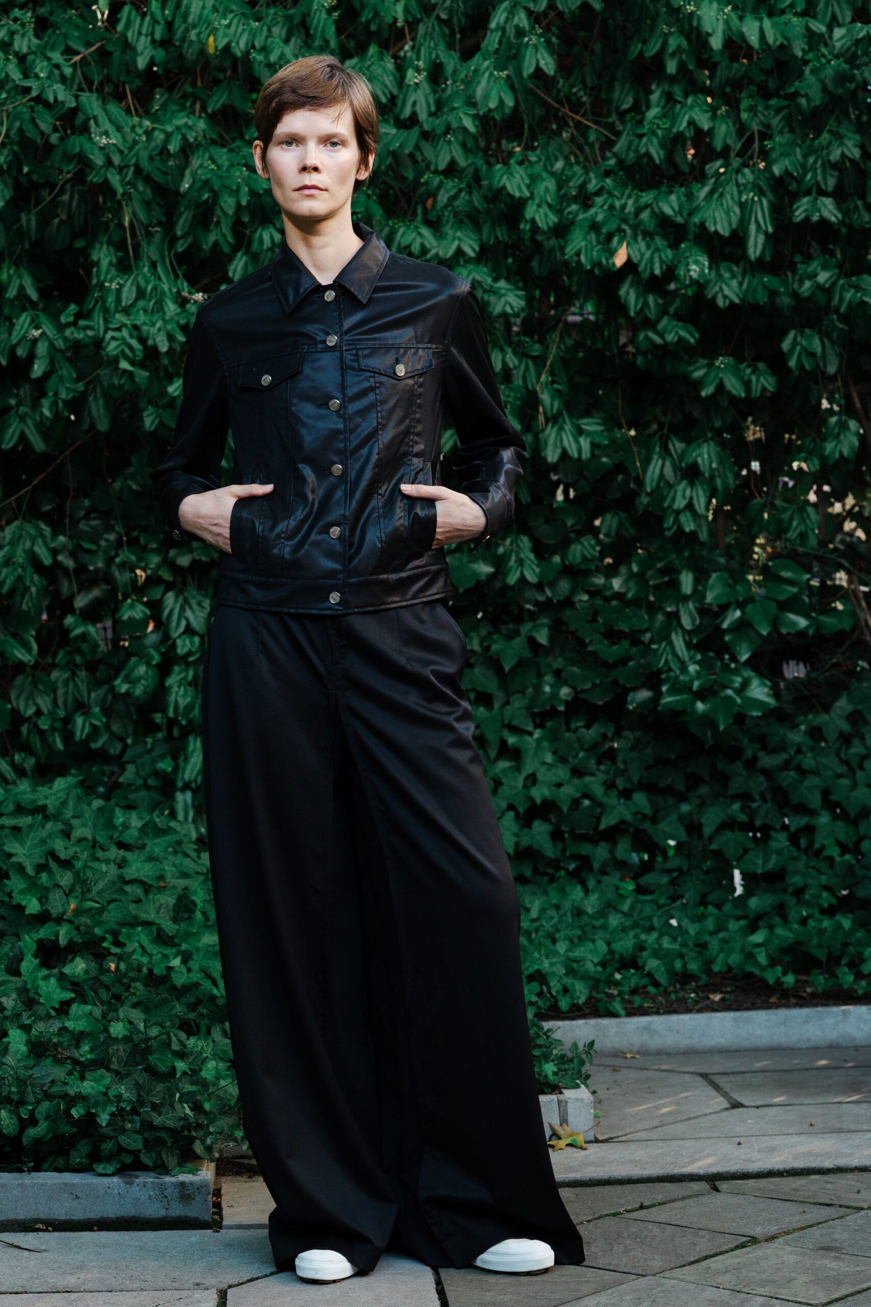 black leather jacket and relaxed pants