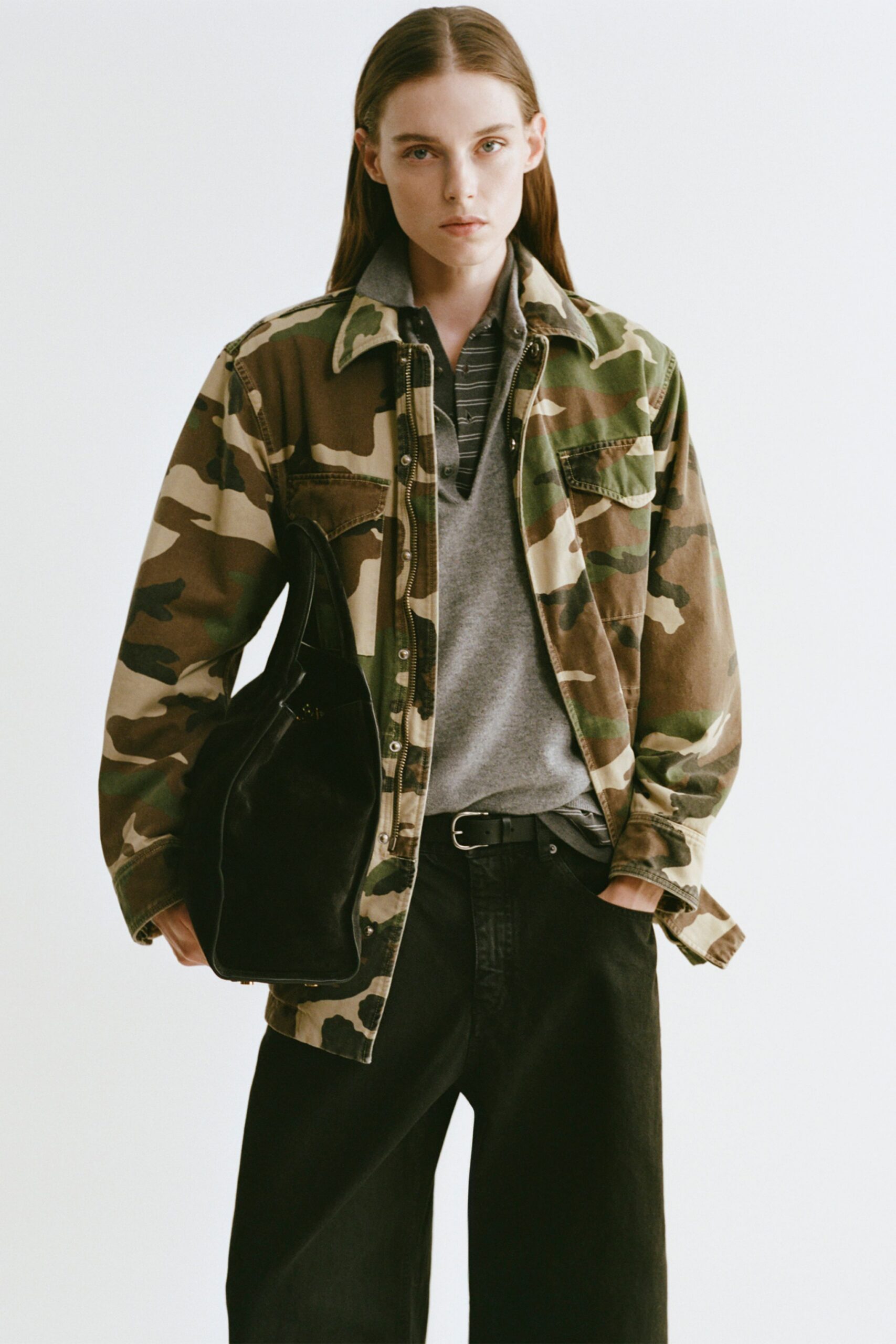 camouflage jacket gray top black pants