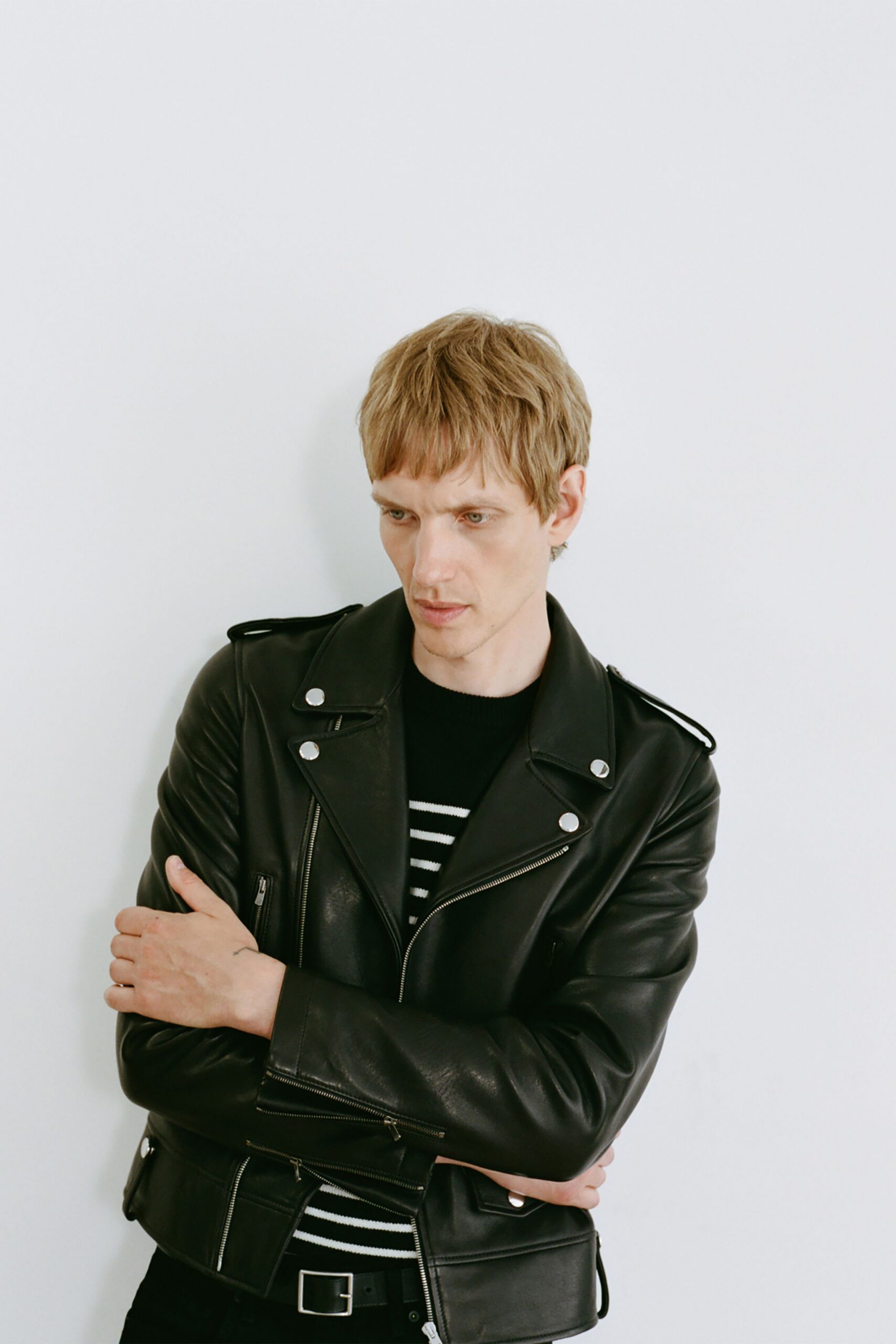 black leather jacket with striped shirt