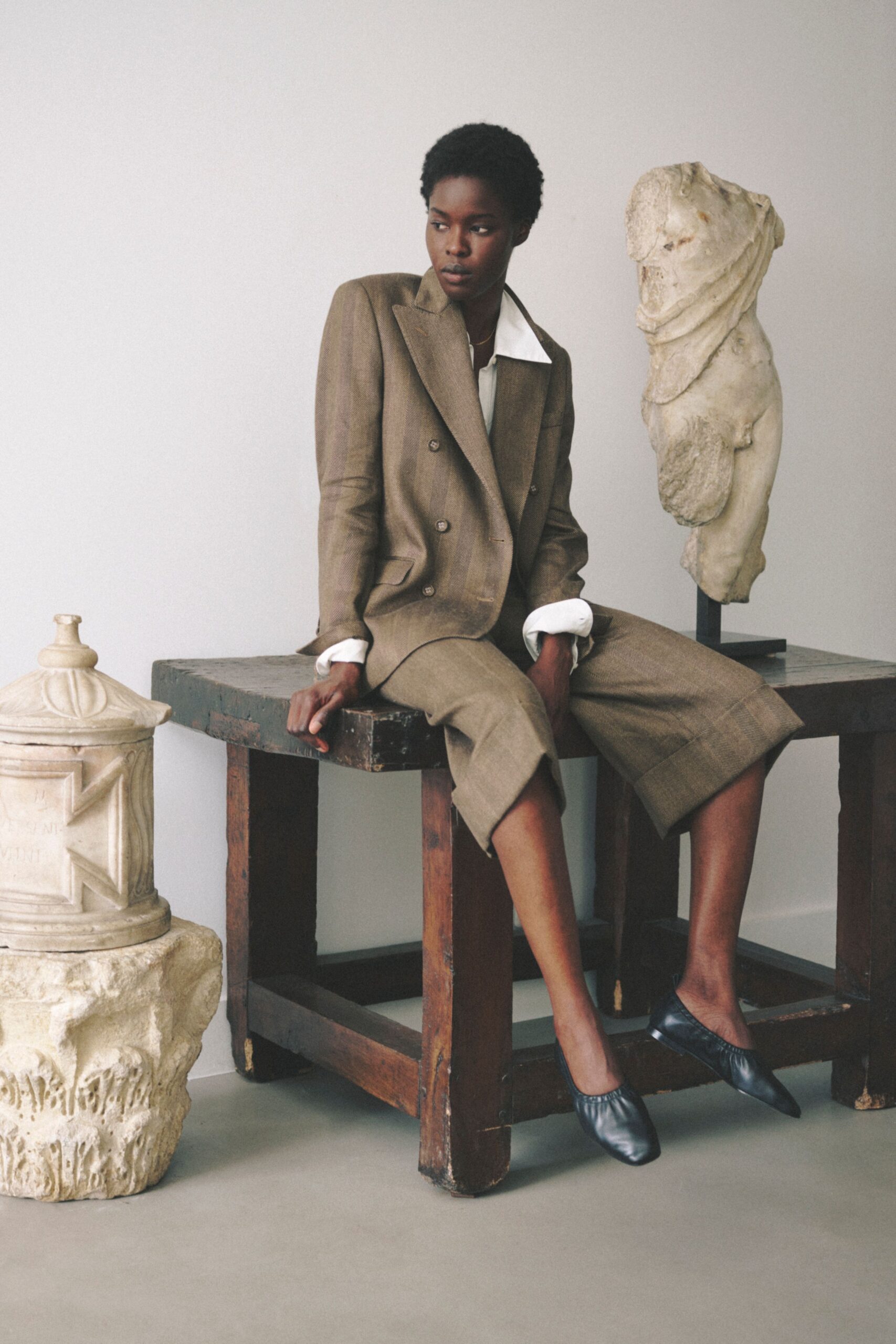 brown tailored suit with shorts