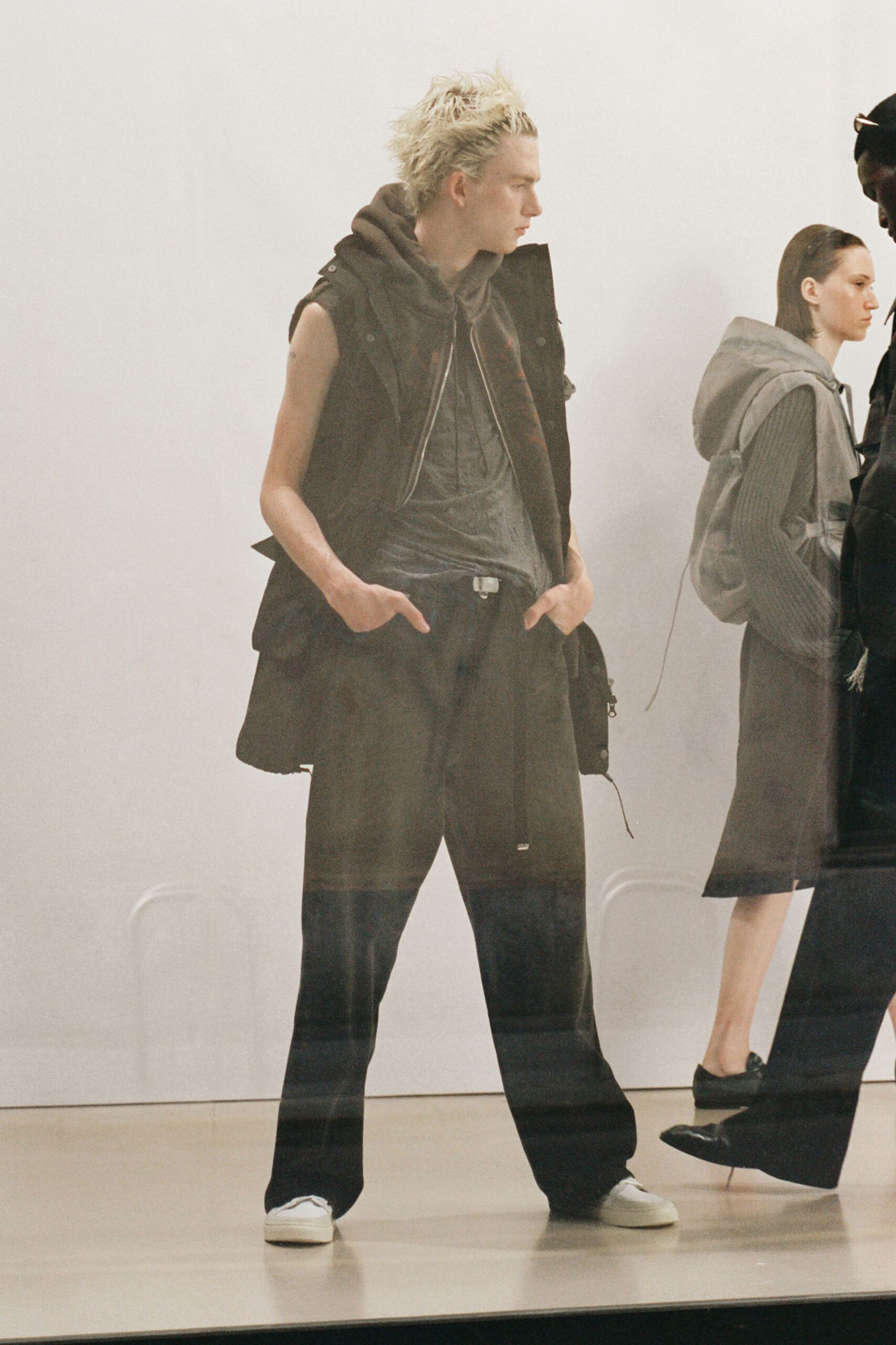 black relaxed vest with gray t-shirt